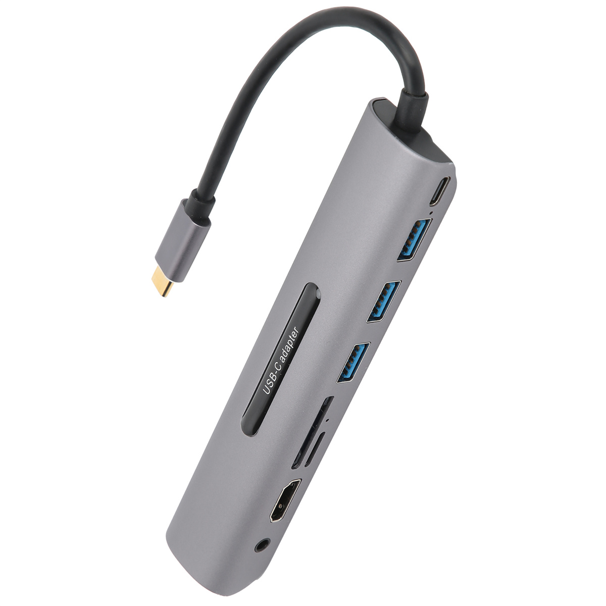 Ein grauer USB-Adapter mit mehreren Anschlüssen und einem schwarzen Kabel auf weißem Grund.
