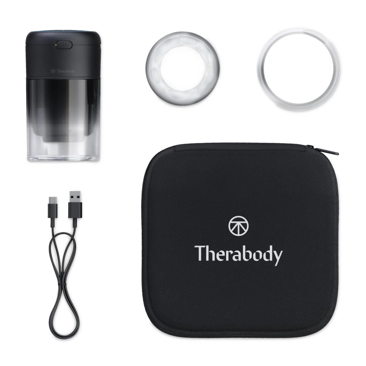Dispositivo de recuperación Therabody con accesorios. Incluye una funda negra, un cable de carga y anillos.