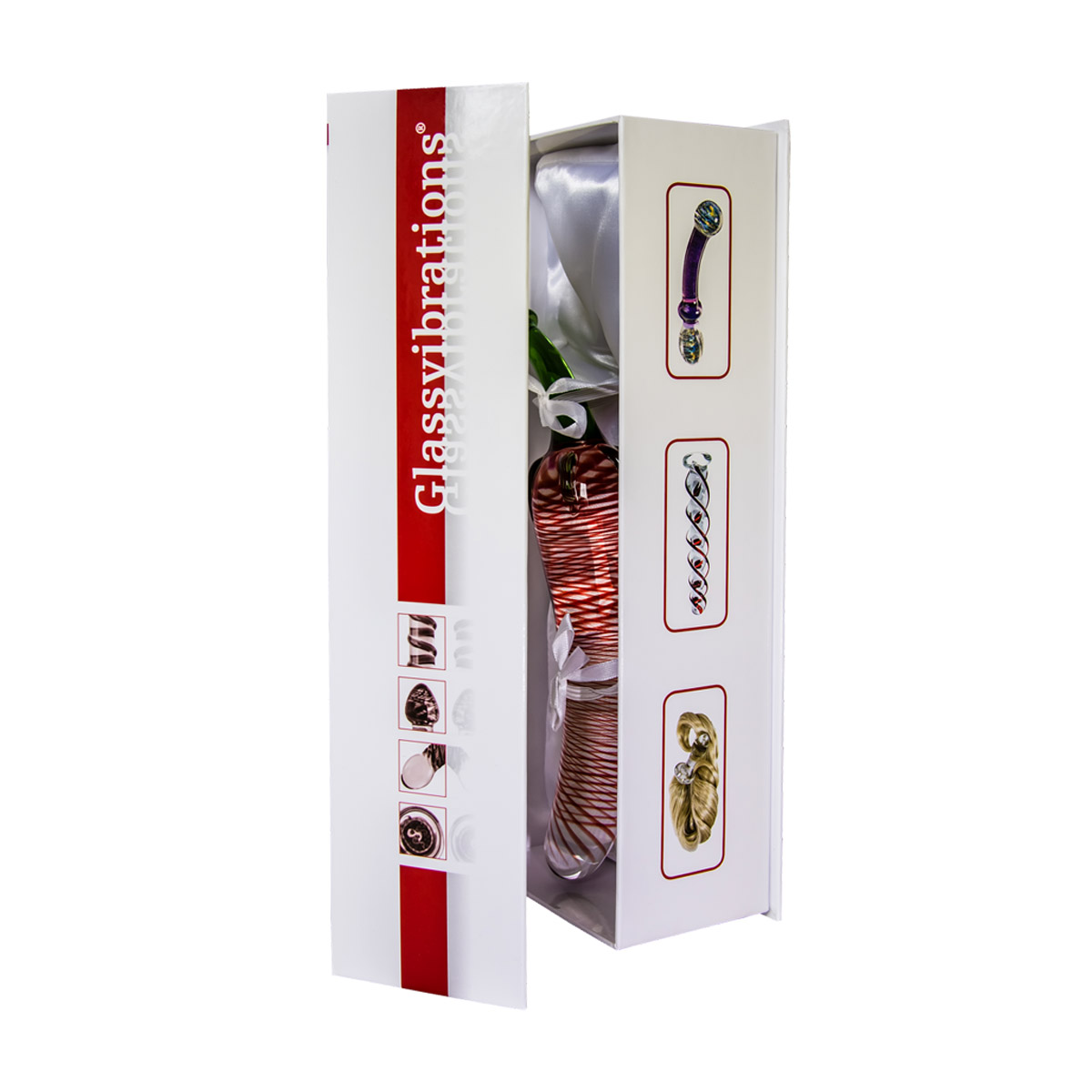 Ein Glasvibrator in einer offenen weißen Box mit roten Akzenten. Es hat ein weißes Satin-Interieur und dekorative Elemente.