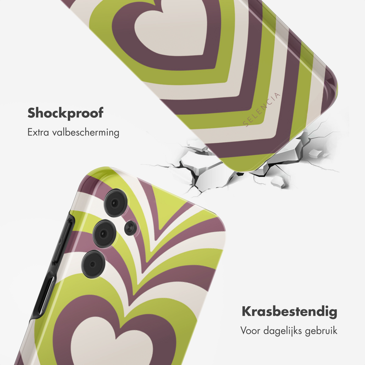 Telefoonhoesje met hartpatroon in groen en paars. Gebroken vloer op de achtergrond.
