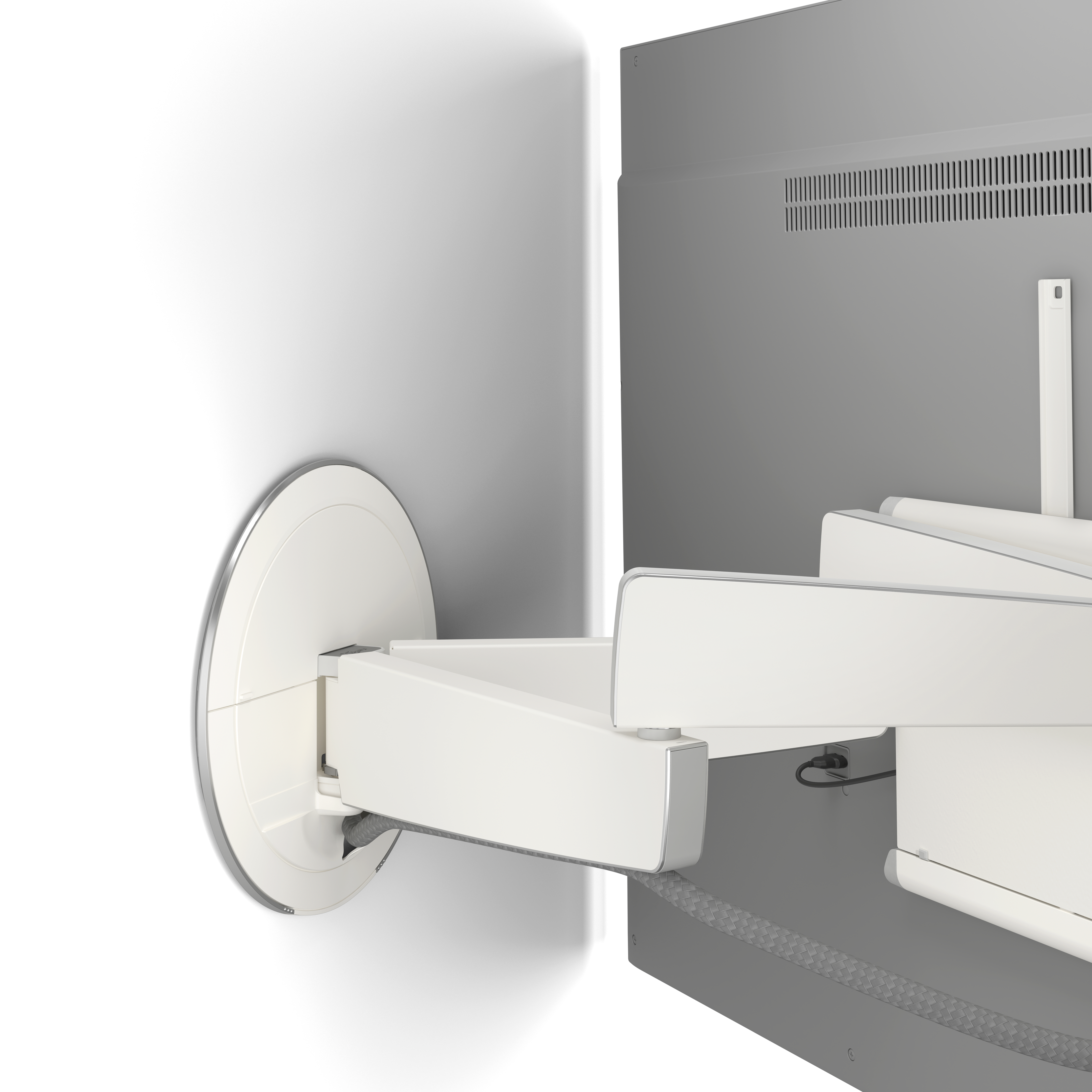 Biały uchwyt ścienny do telewizora, biało-srebrny, wysunięty z białej ściany. Szary tył TV.