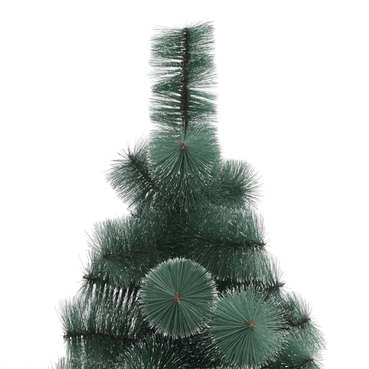 Nahaufnahme des oberen Teils eines grünen Weihnachtsbaums, zeigt die Nadeln und Spitzen.