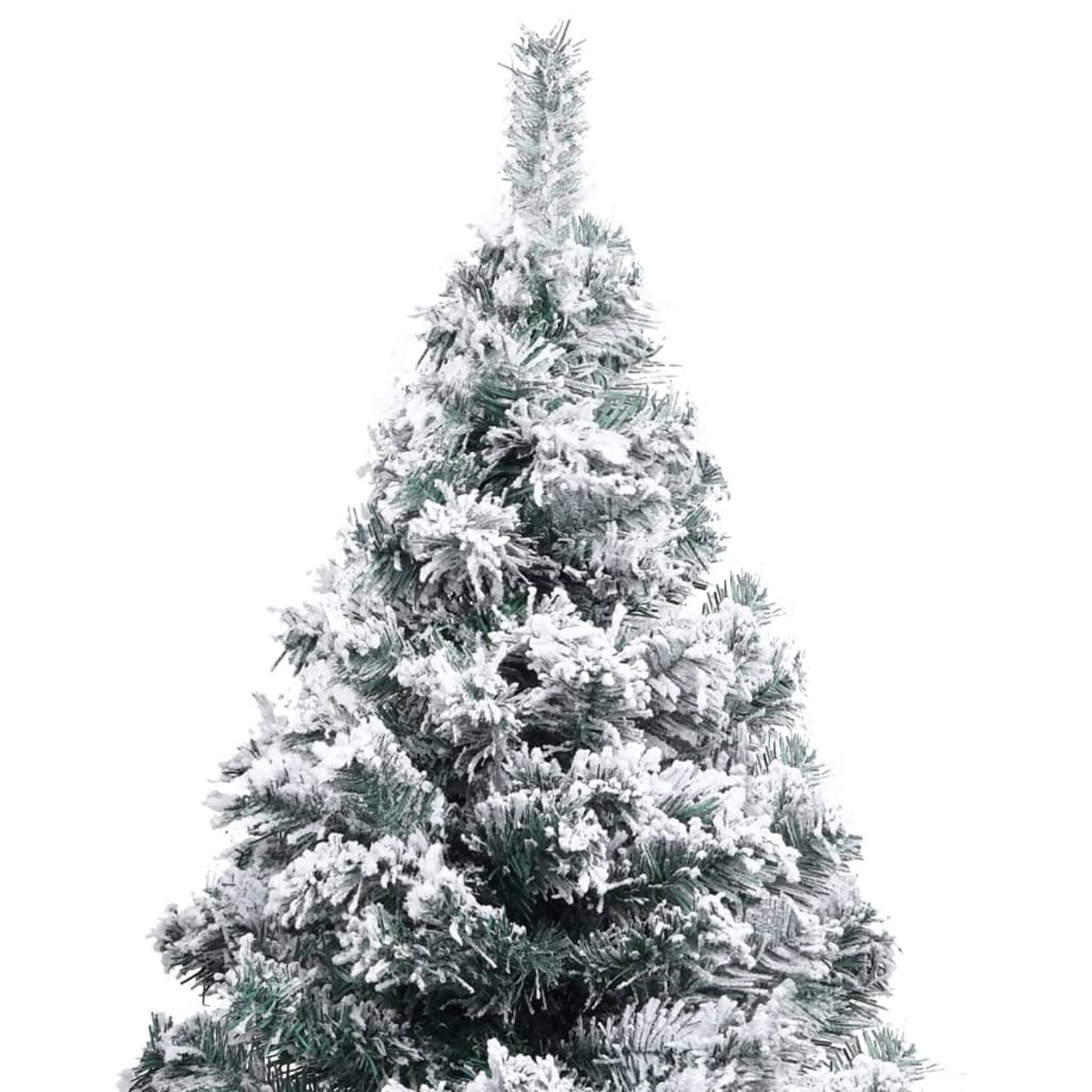 Nahaufnahme der Spitze eines schneebedeckten Weihnachtsbaums. Grüne Nadeln und Schnee.