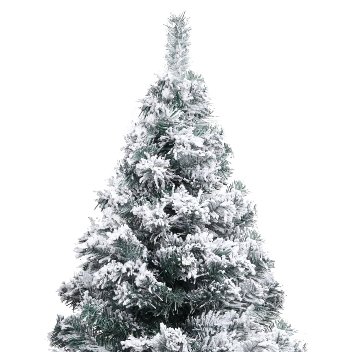 Nahaufnahme einer geschmückten Weihnachtsbaumspitze. Grüne Nadeln mit weißem Schnee auf weißem Grund.