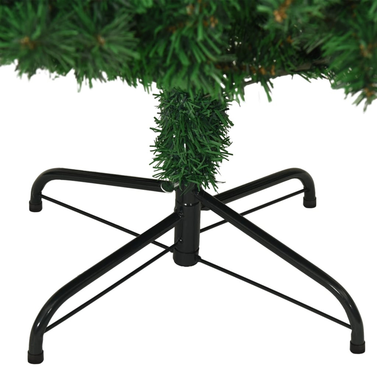 Ein Weihnachtsbaumfuß mit schwarzen Metallbeinen und grünem Stamm.