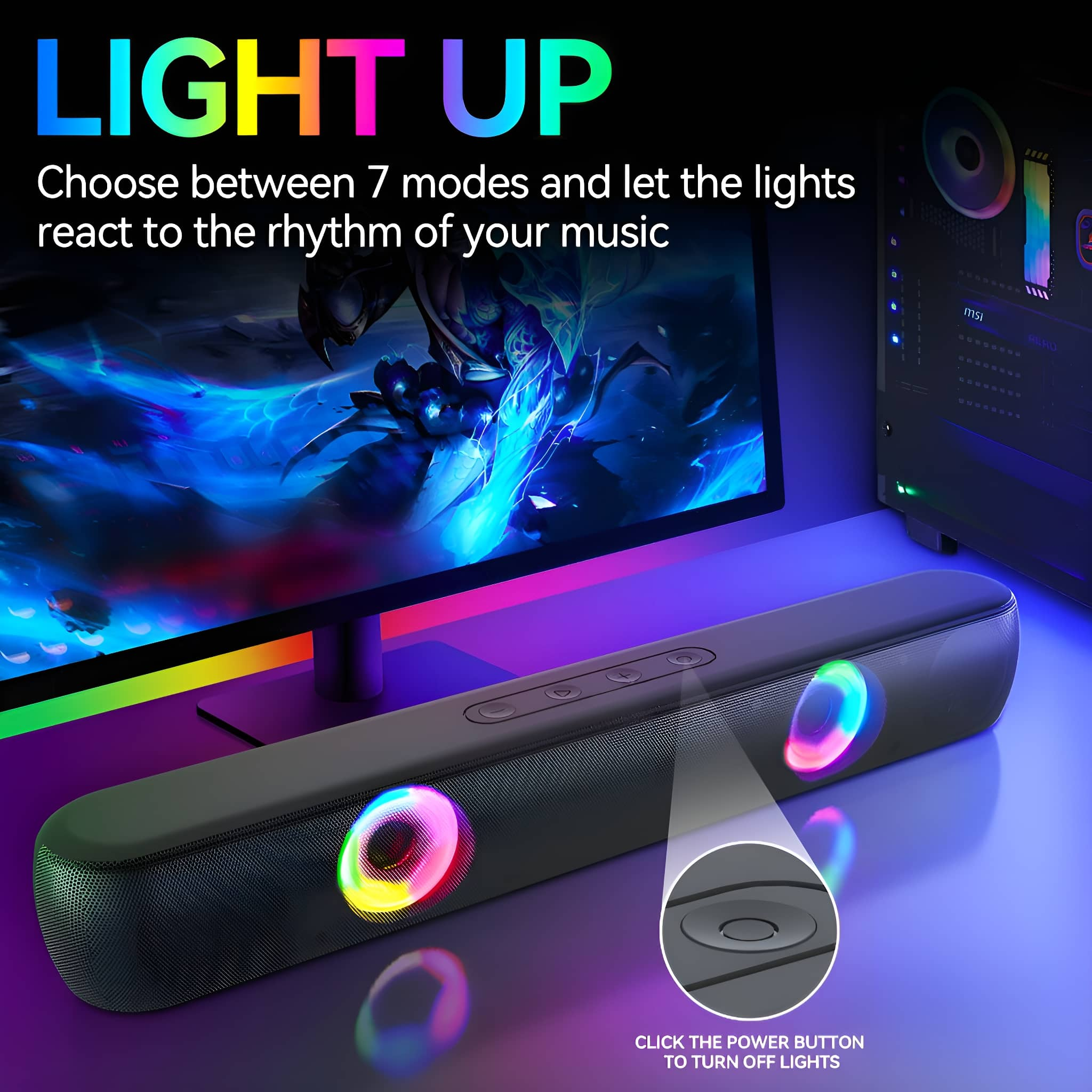 Eine schwarze Soundbar mit bunten Lichtern, ein Computermonitor und ein schwarzes Computergehäuse auf einem Tisch.