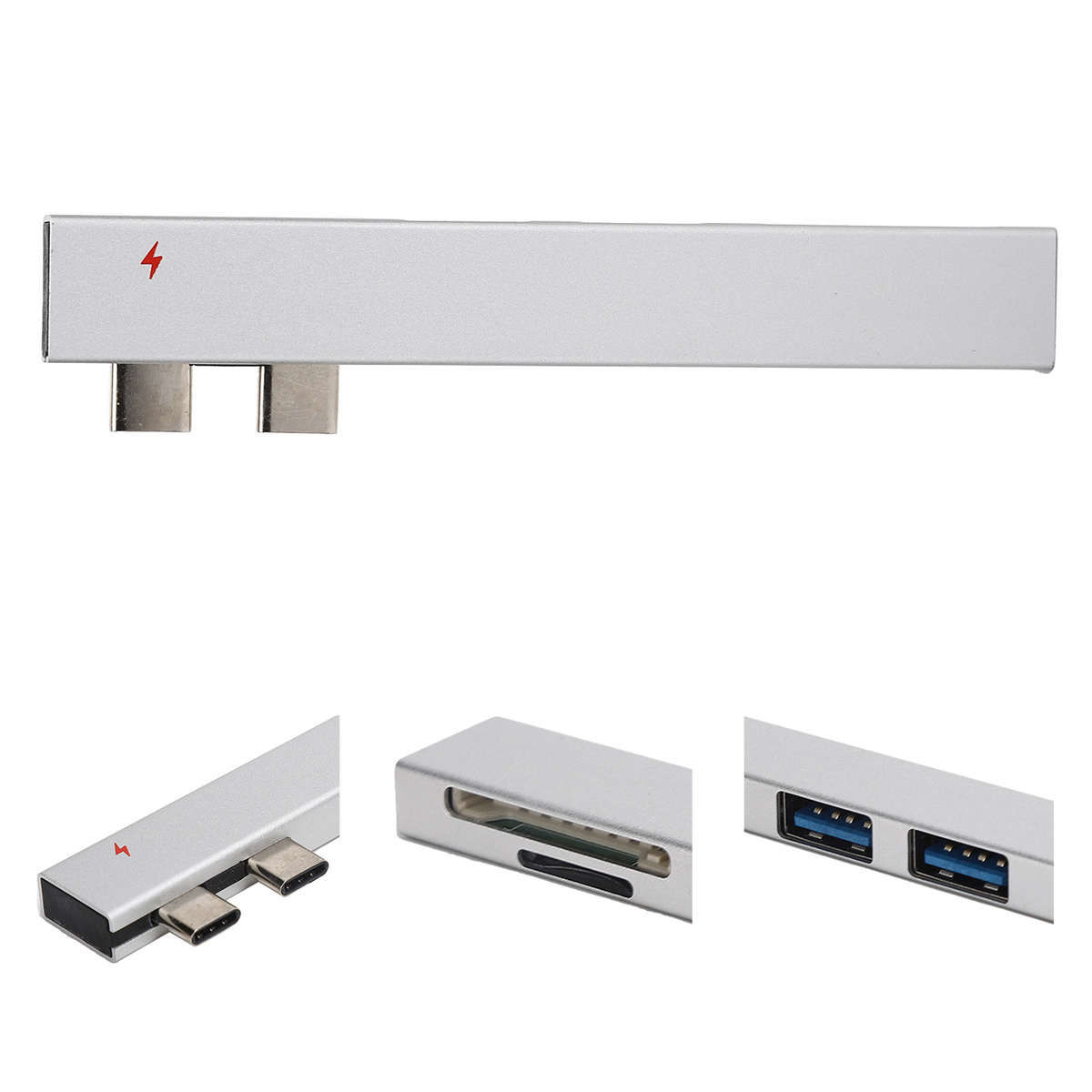 Das Bild zeigt einen silbernen USB-Hub mit Anschlüssen und Steckern.