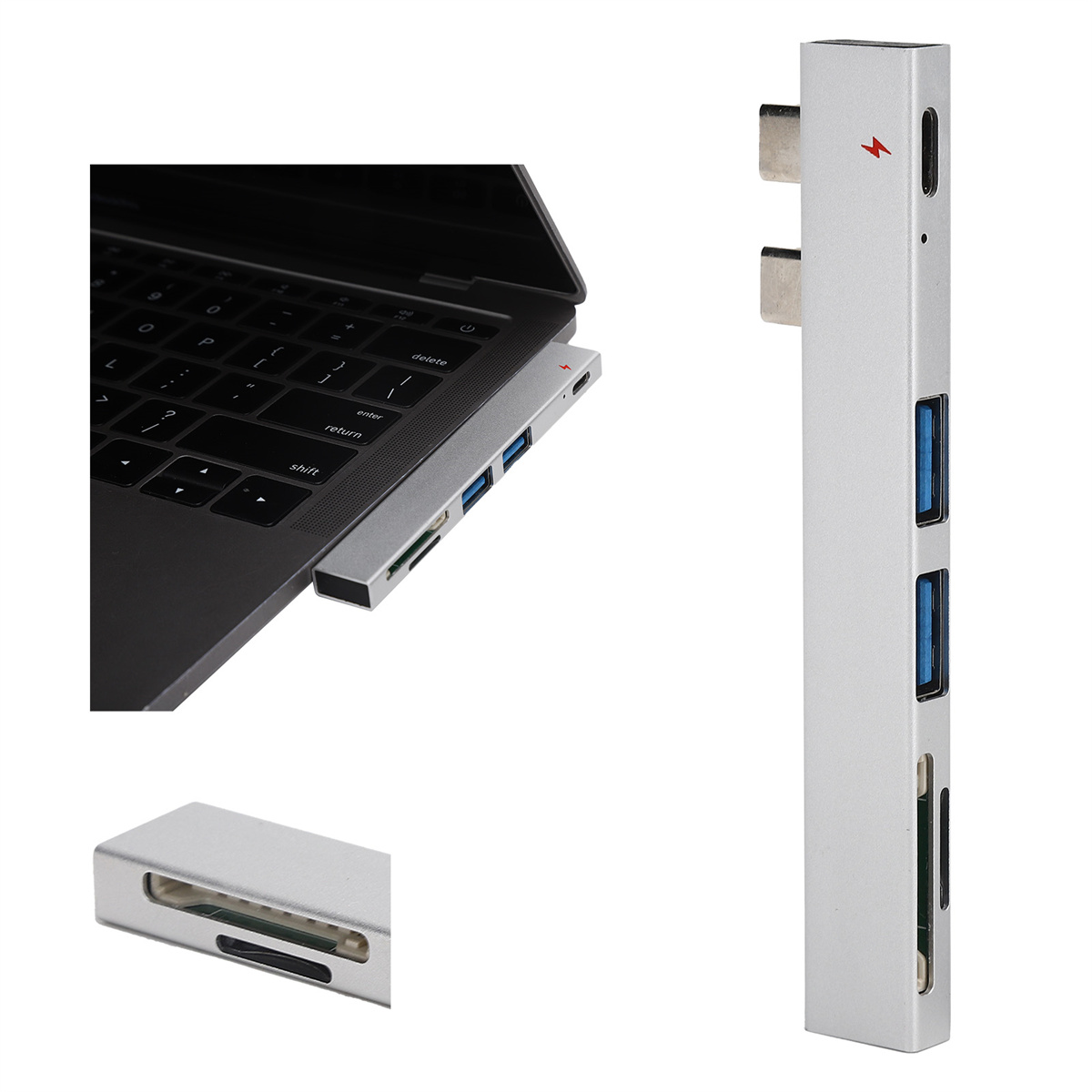 Ein Laptop mit angeschlossenem silbernen USB-Hub. Der Hub hat Anschlüsse und befindet sich neben der Tastatur.
