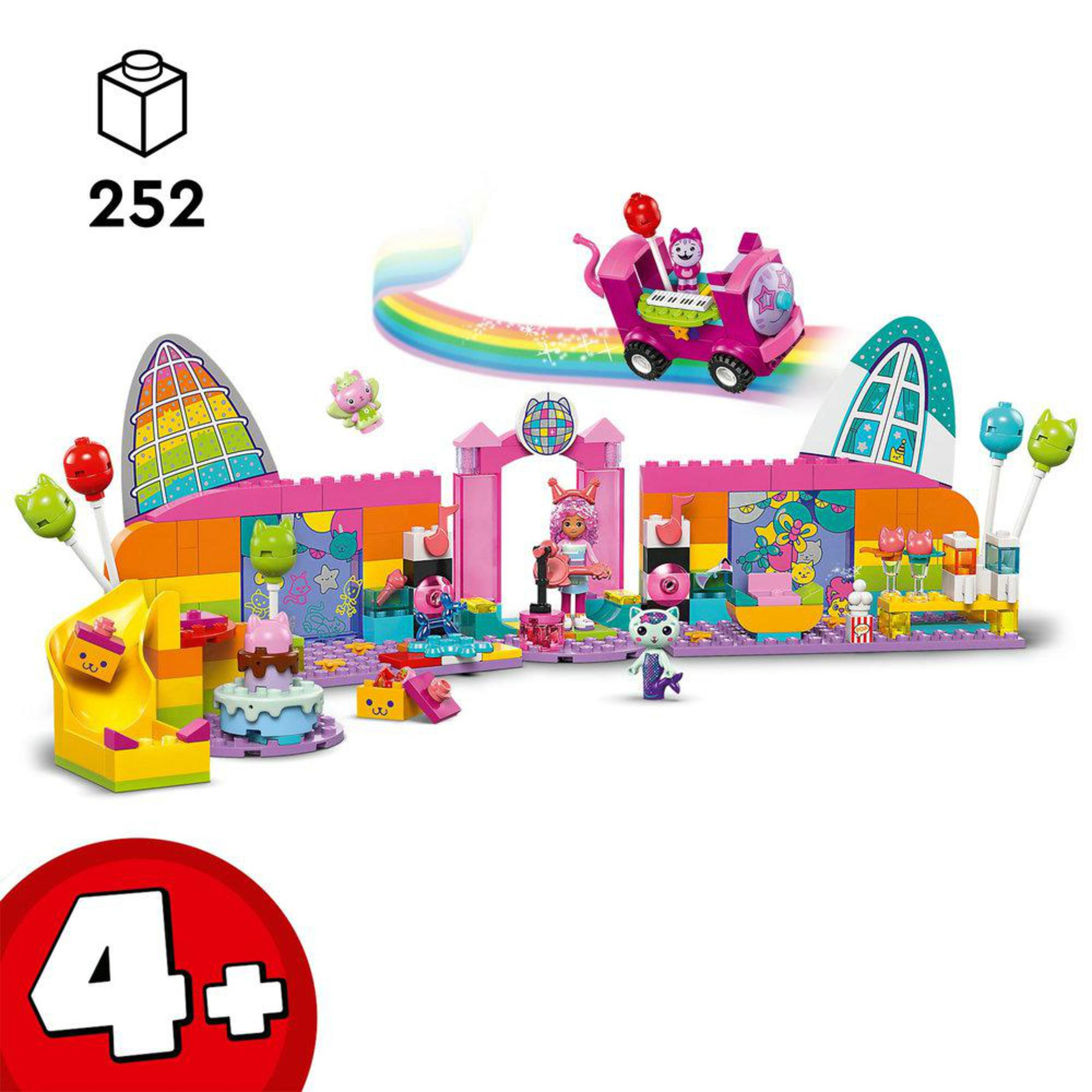 Gökkuşağı ve pembe bir araba ile Lego Duplo oyun seti. Tema bir parti gibi görünüyor.