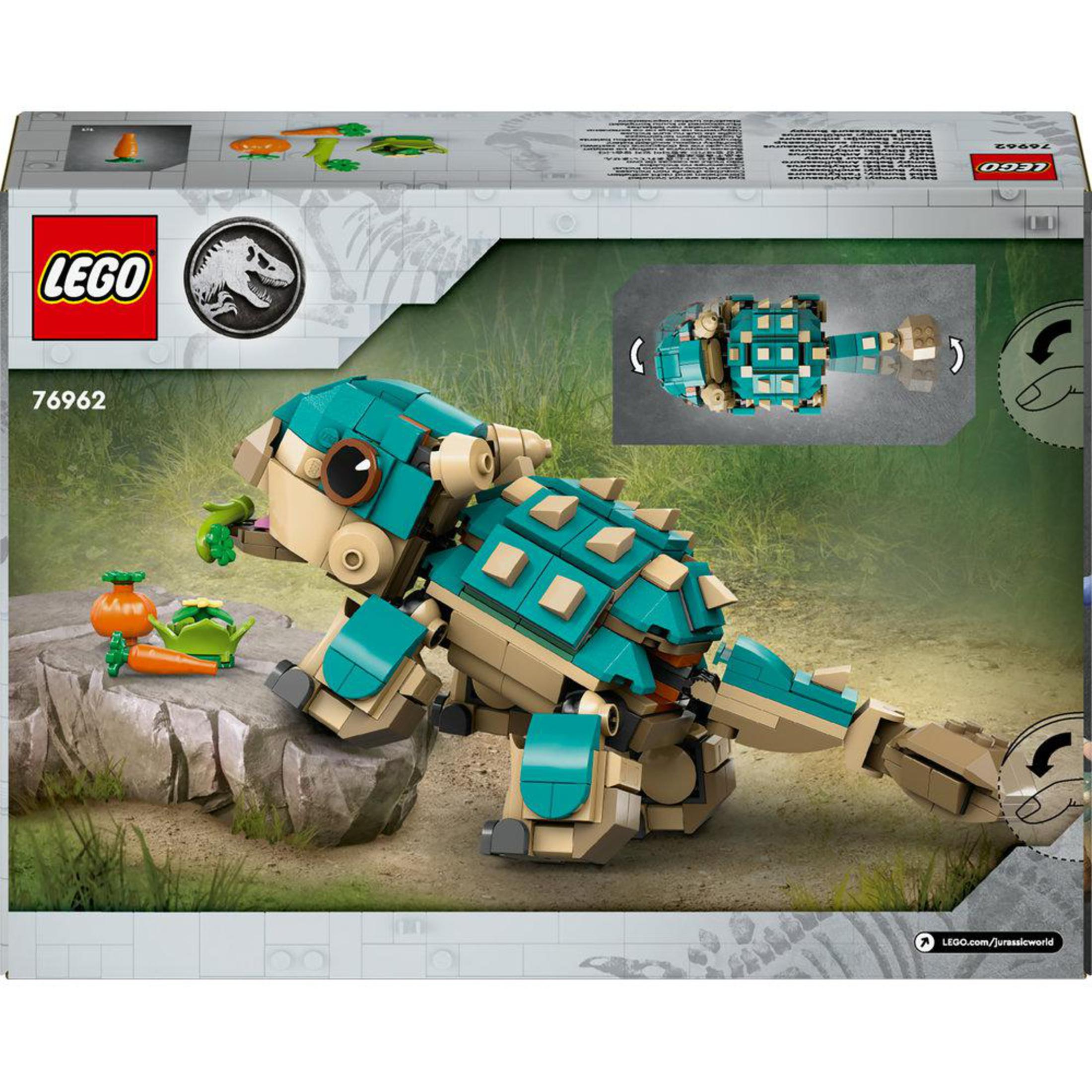 Arte de la caja de Lego con un dinosaurio, verduras y una roca. La caja está abierta.
