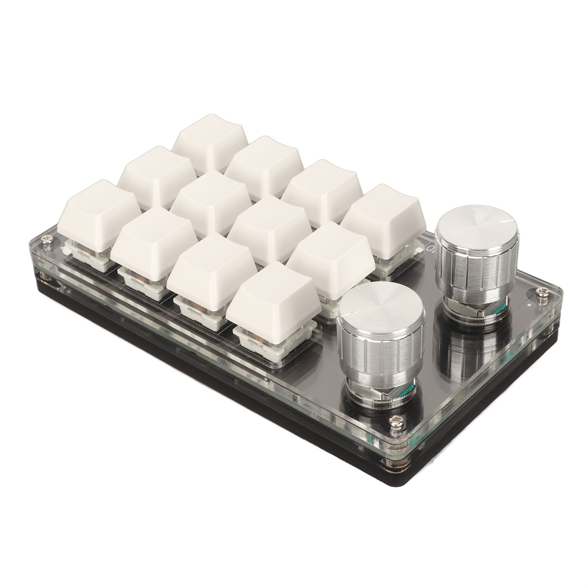 Eine weiße Tastatur mit 12 Tasten und zwei silbernen Knöpfen auf einer transparenten Oberfläche.