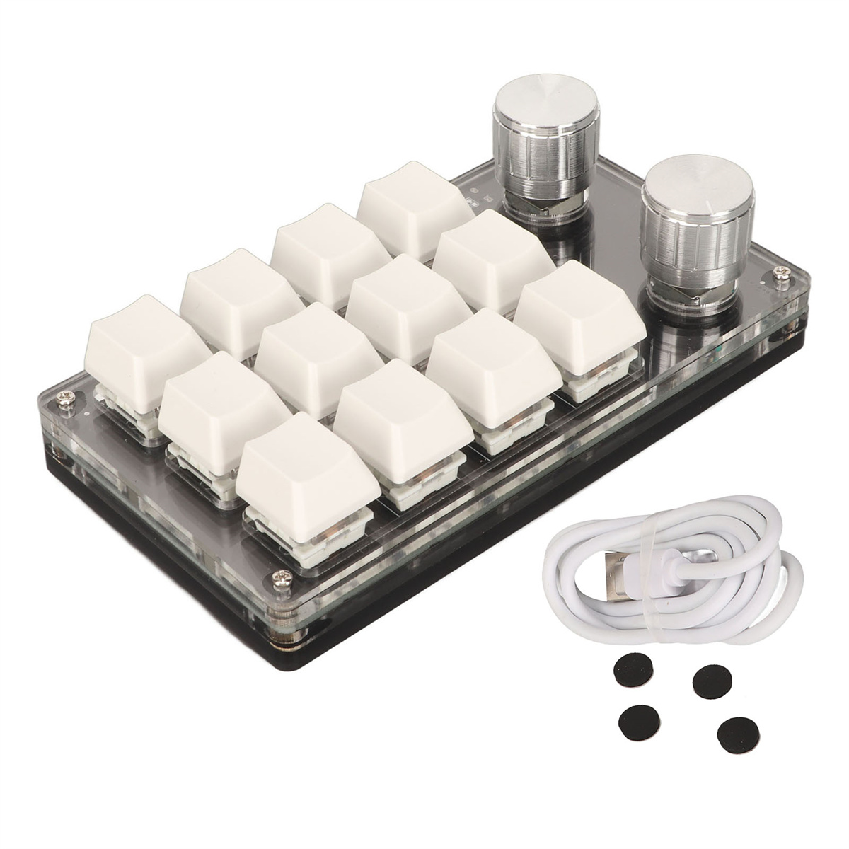 Eine kleine Tastatur mit weißen Tasten, zwei silbernen Knöpfen, einem weißen Kabel und schwarzen Pads.