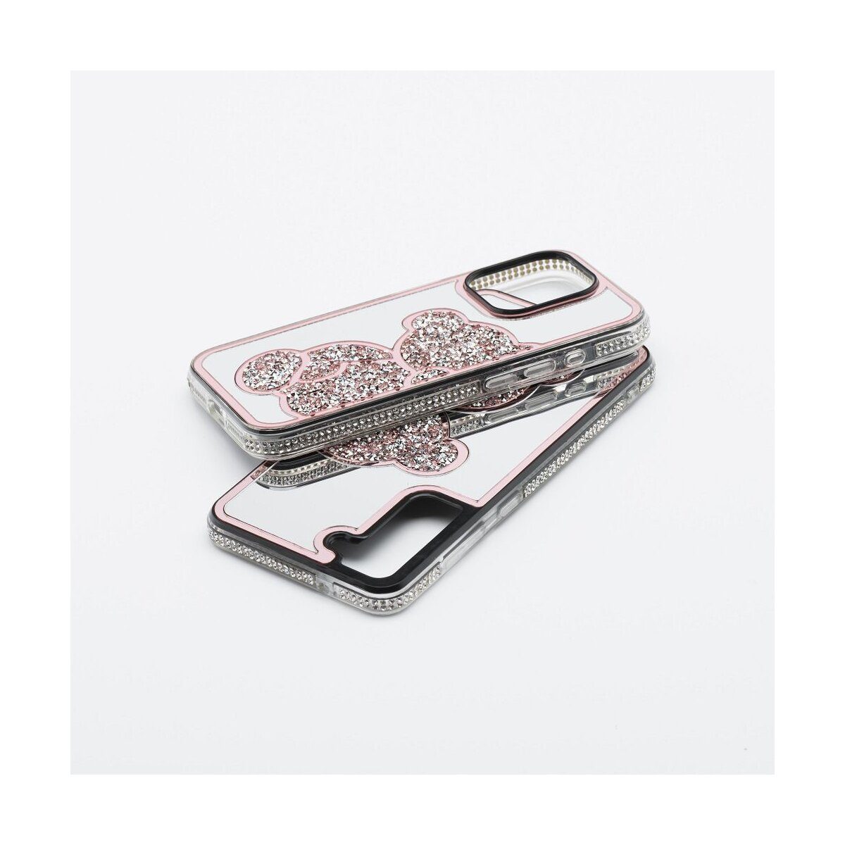 Due custodie per telefono con un design a nuvola rosa scintillante su sfondo bianco.