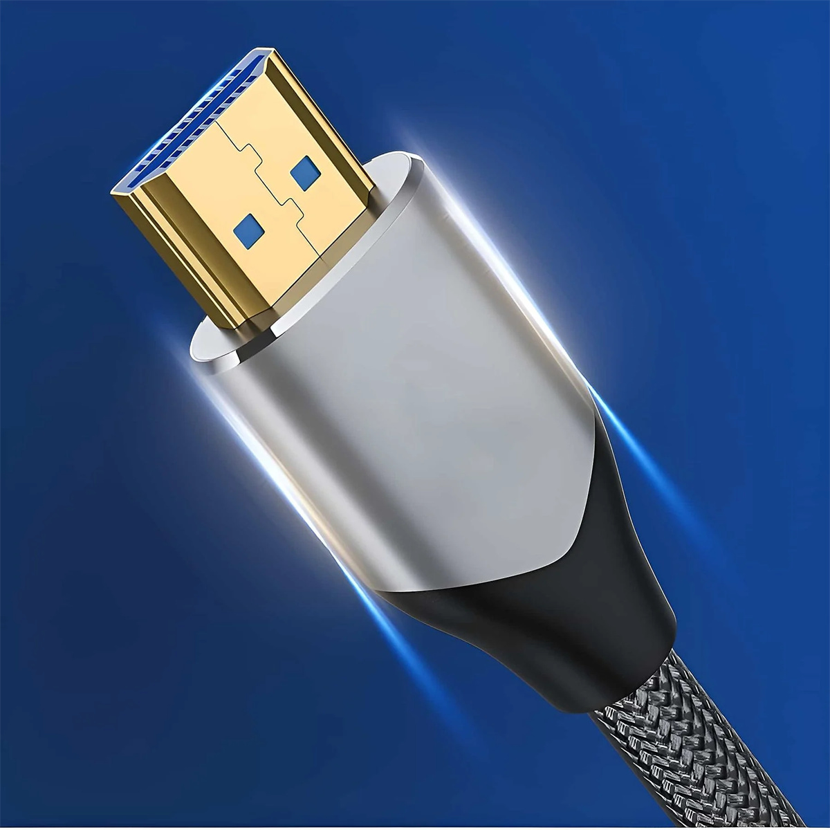 HDMI-Kabel mit Goldanschluss und silbernem Gehäuse, schwarzem Ende, auf blauem Farbverlauf.