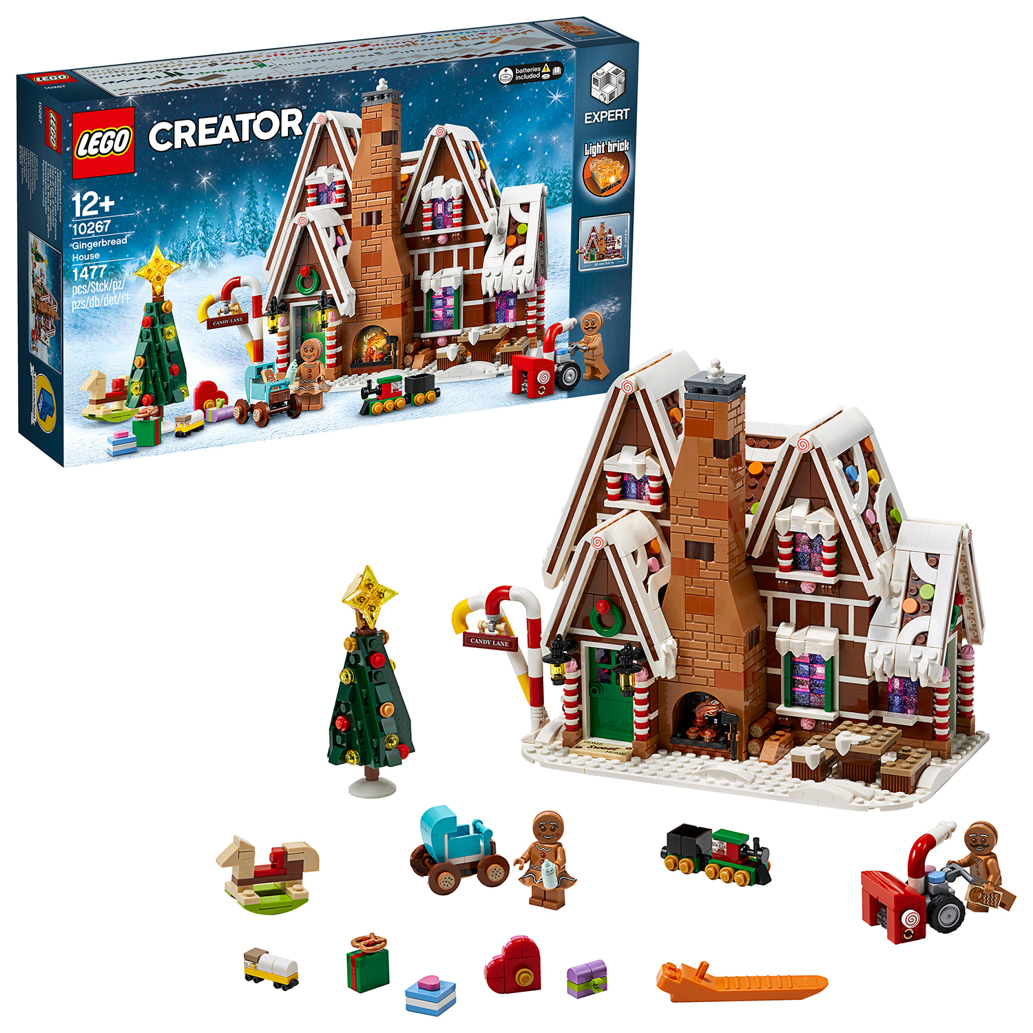Set e accessori Lego della casa di pan di zenzero. Il set include una casa, un albero, un treno e personaggi di pan di zenzero. Sfondo innevato.