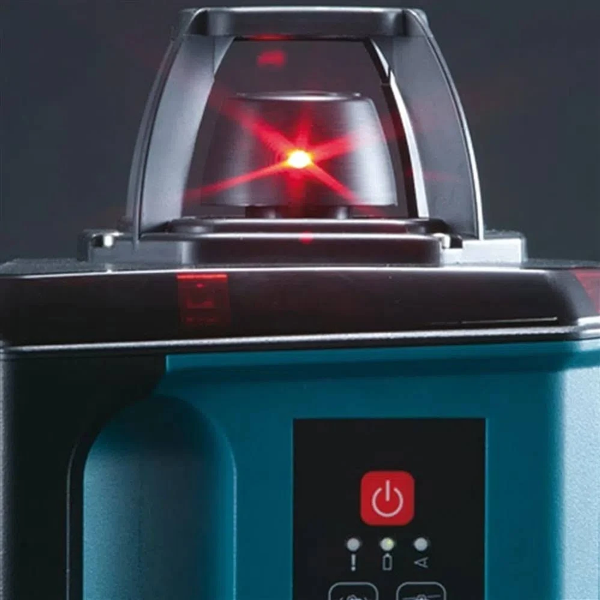 Ein roter Laser-Wasserwaage mit einem roten Strahl, der von oben emittiert.