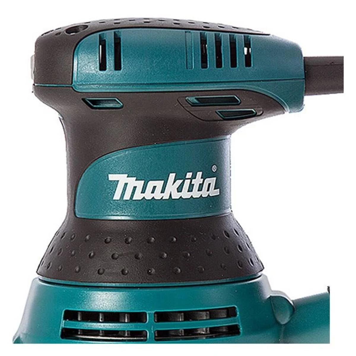 Primer plano de una lijadora Makita, turquesa y negra, vista superior, con el logo de Makita.