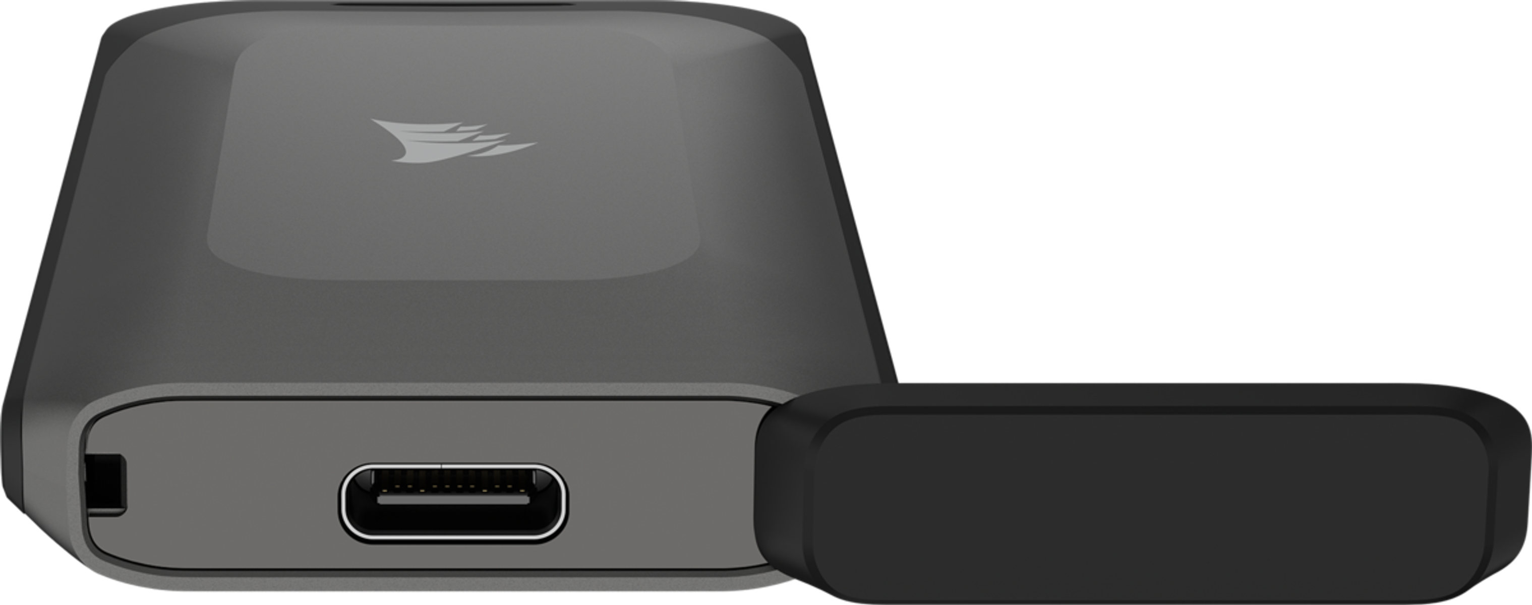 Czarne i szare urządzenie z portem USB-C, obok mniejszego czarnego elementu. Tło jest czarne.