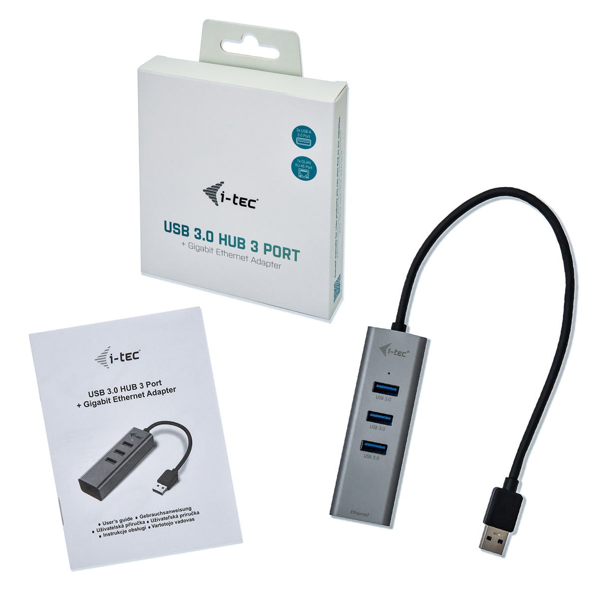 Een grijze USB 3.0 hub, doos en handleiding op een witte achtergrond. De hub heeft 4 USB-poorten.