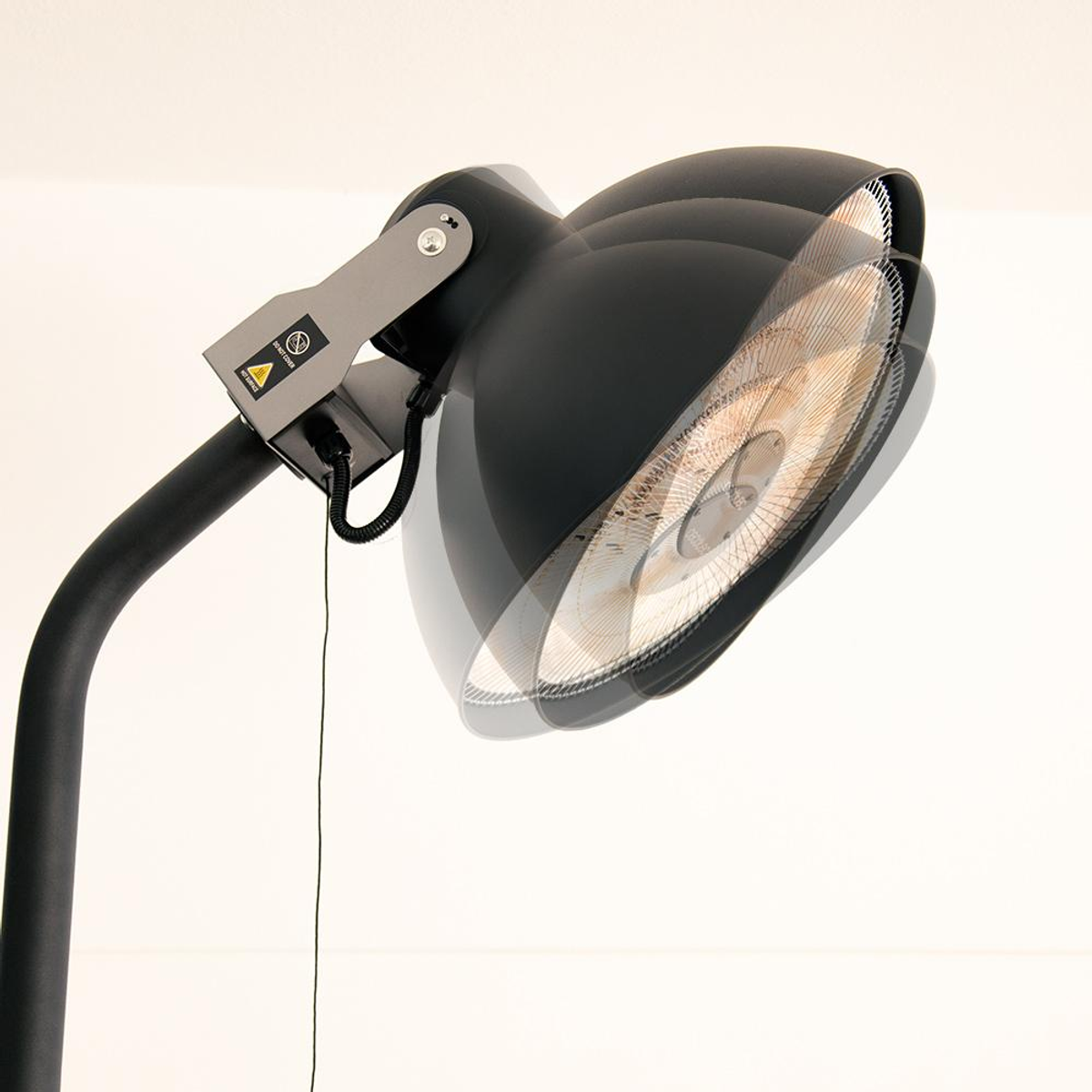 Secador de pelo negro con luz enfocada, orientado hacia el espectador.