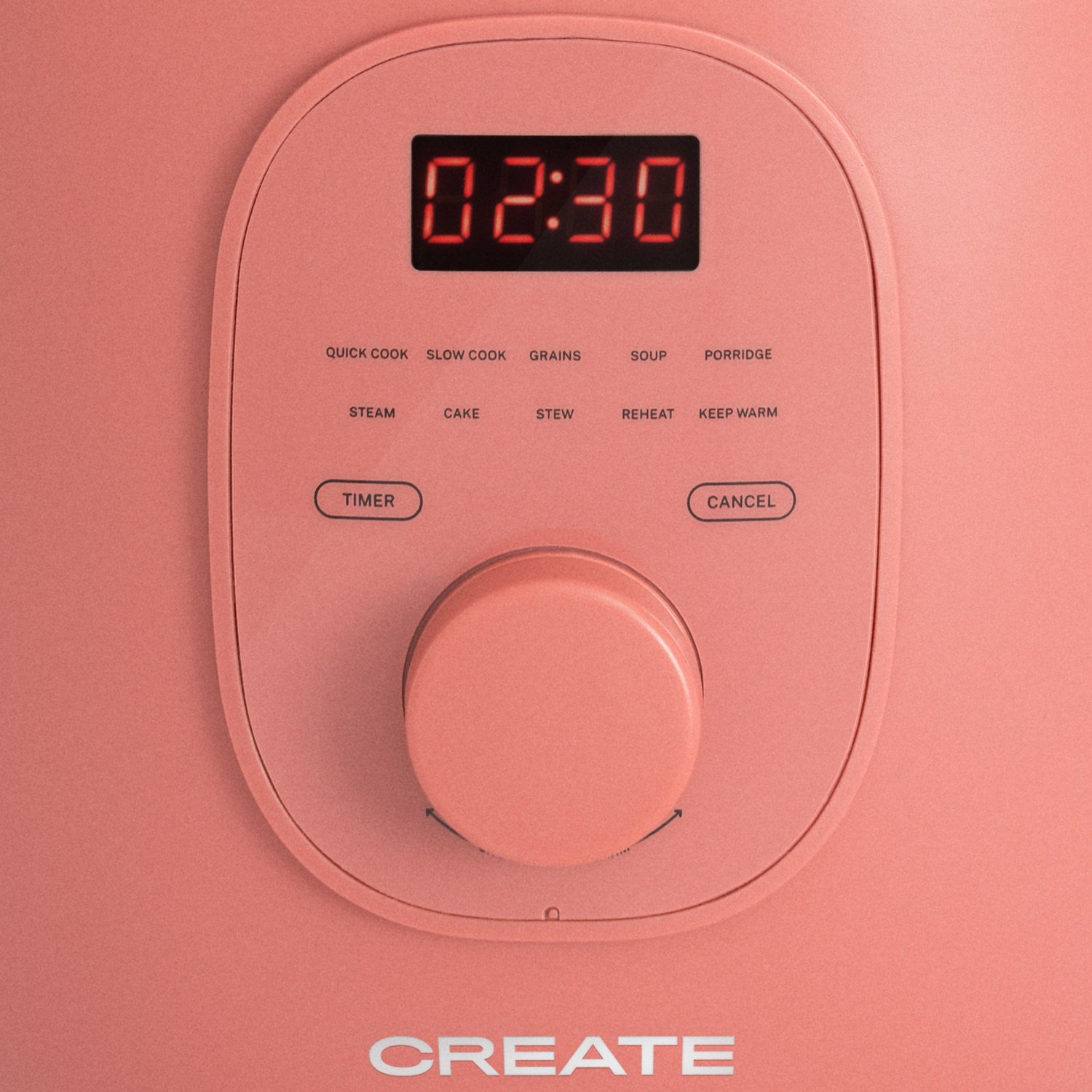 Un electrodoméstico de cocina rosa con una pantalla digital que muestra 02:30 y varios botones de función.