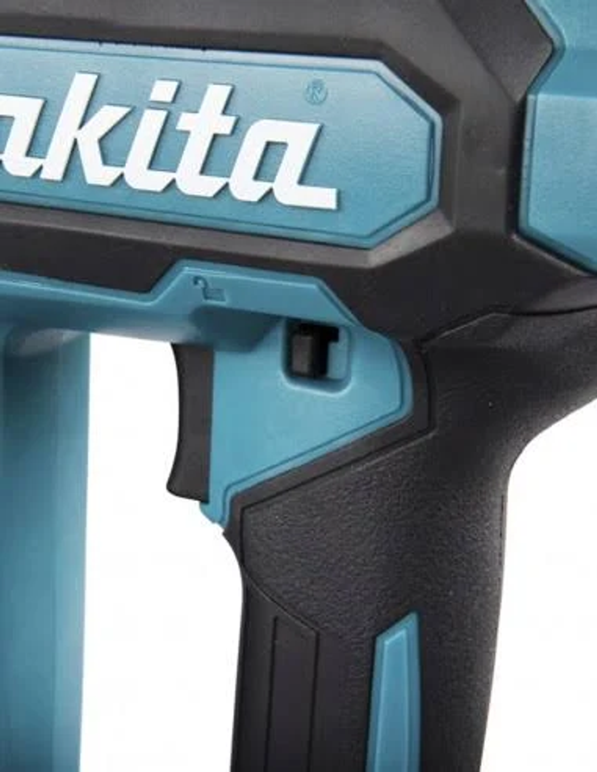 Primo piano di un utensile Makita turchese e nero. Sono visibili un grilletto e un'impugnatura.