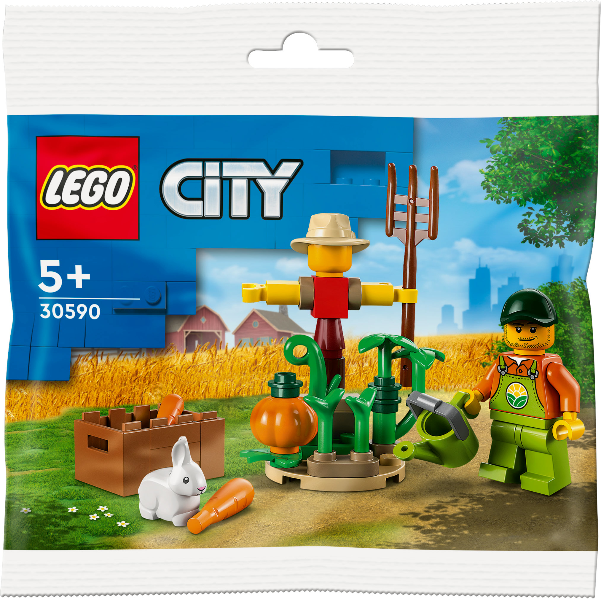 Un set Lego City. Un contadino con un annaffiatoio vicino a uno spaventapasseri e un campo di zucche.