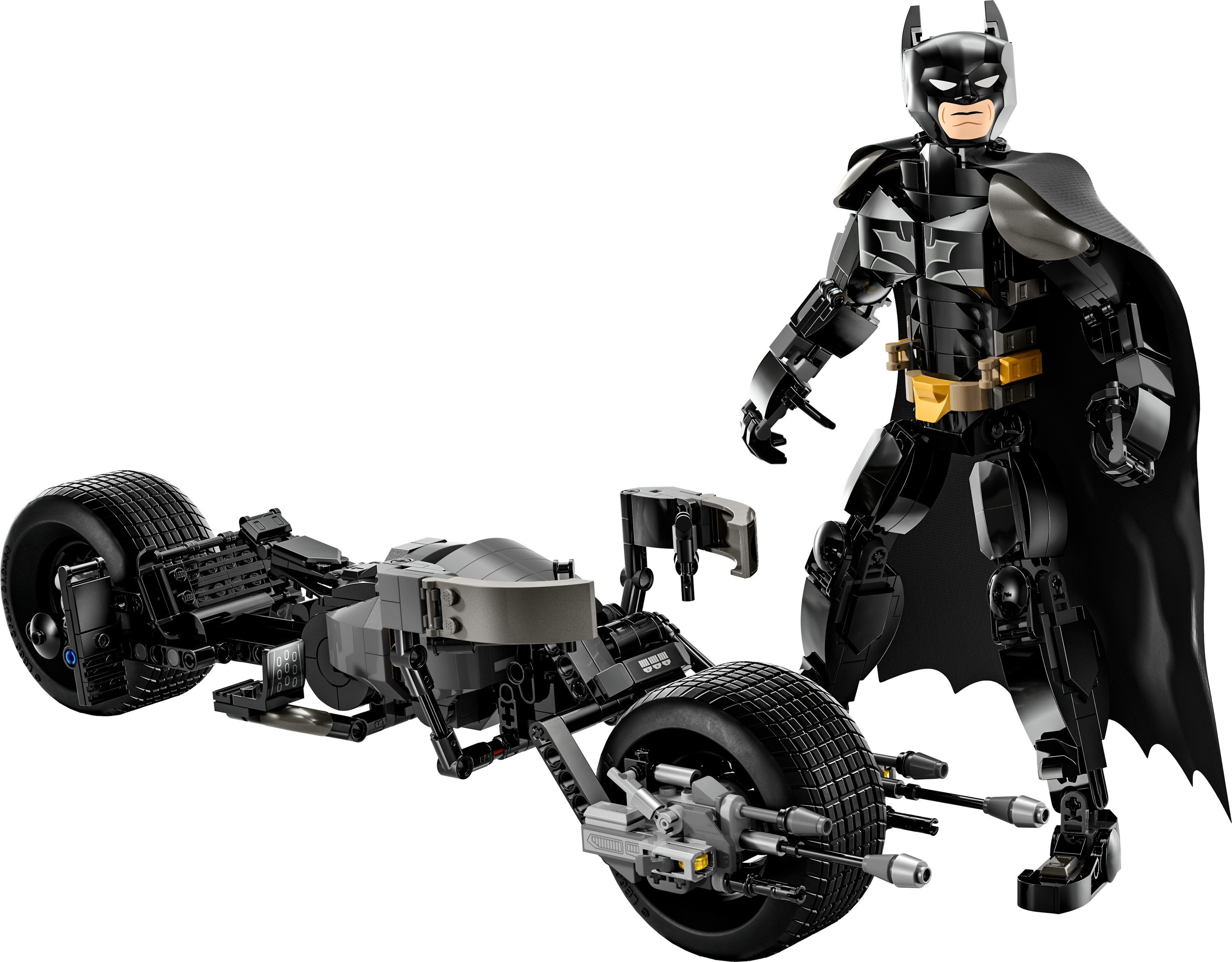 Figurka LEGO Batman i pojazd, ciemnoszary Batmobil, na białym tle.