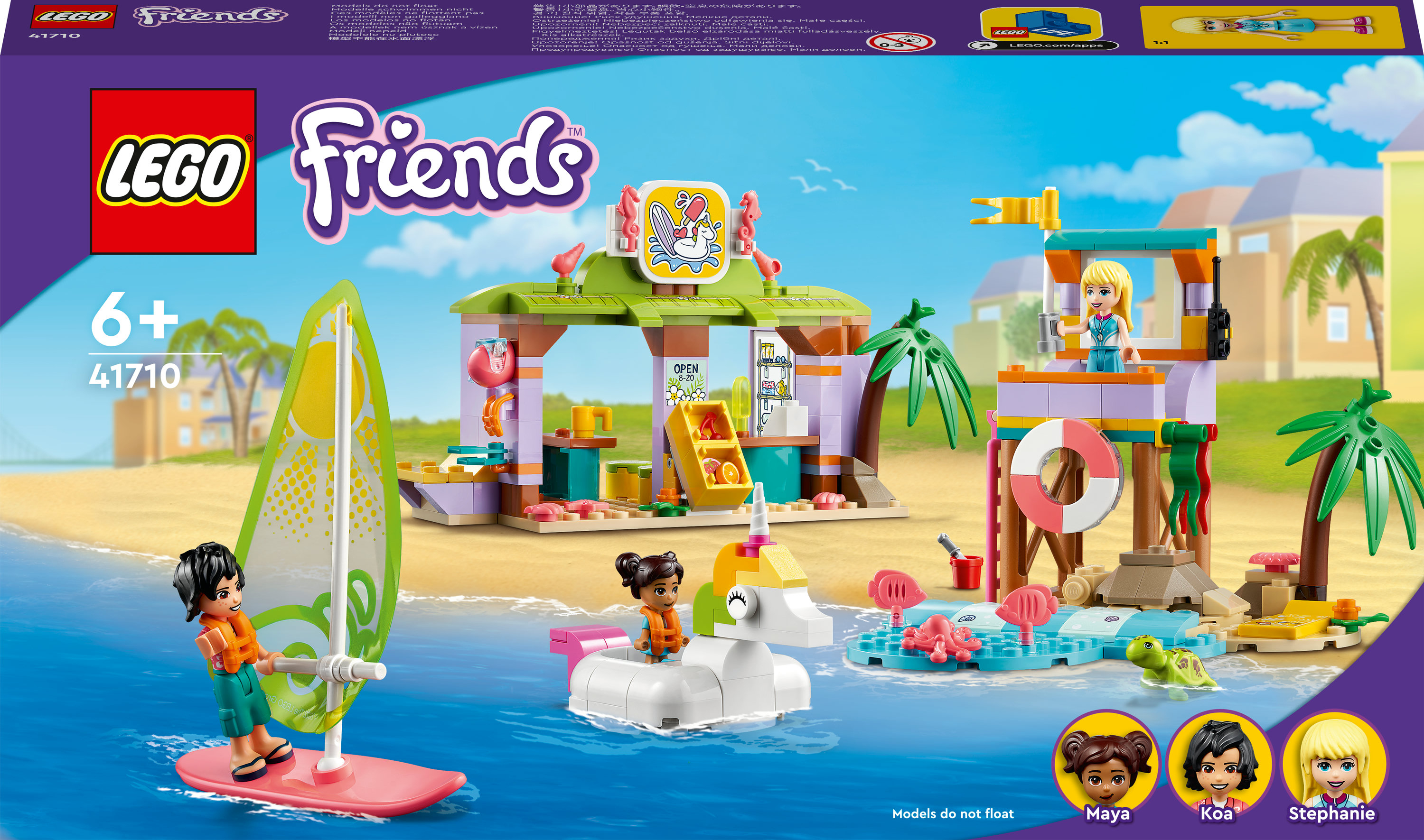Ensemble Lego Friends avec scène de plage, figurines et accessoires. Comprend surfeur, stand et bouée licorne.