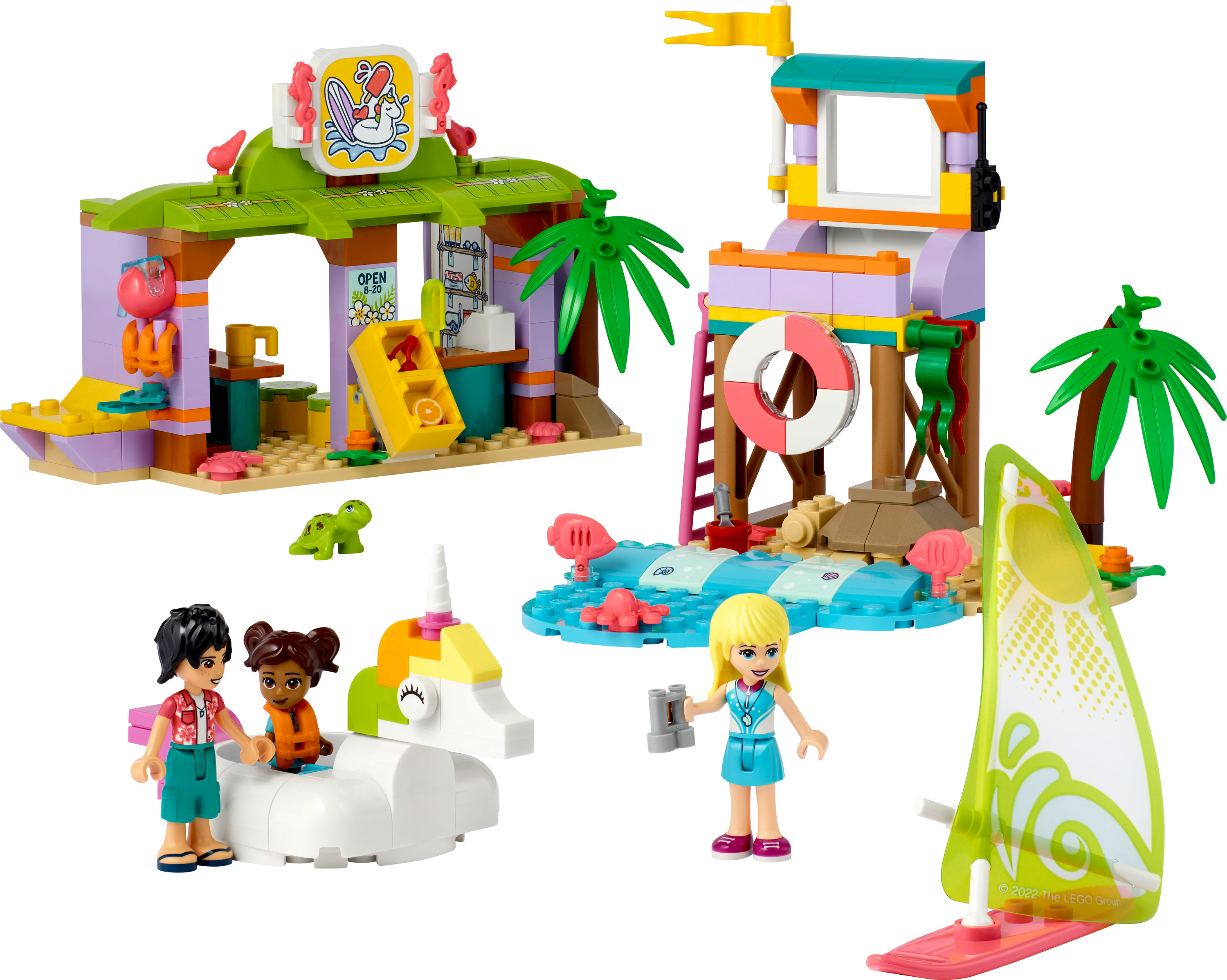Ensemble Lego avec scènes de plage, figurines, tour de sauveteur et bouée licorne.