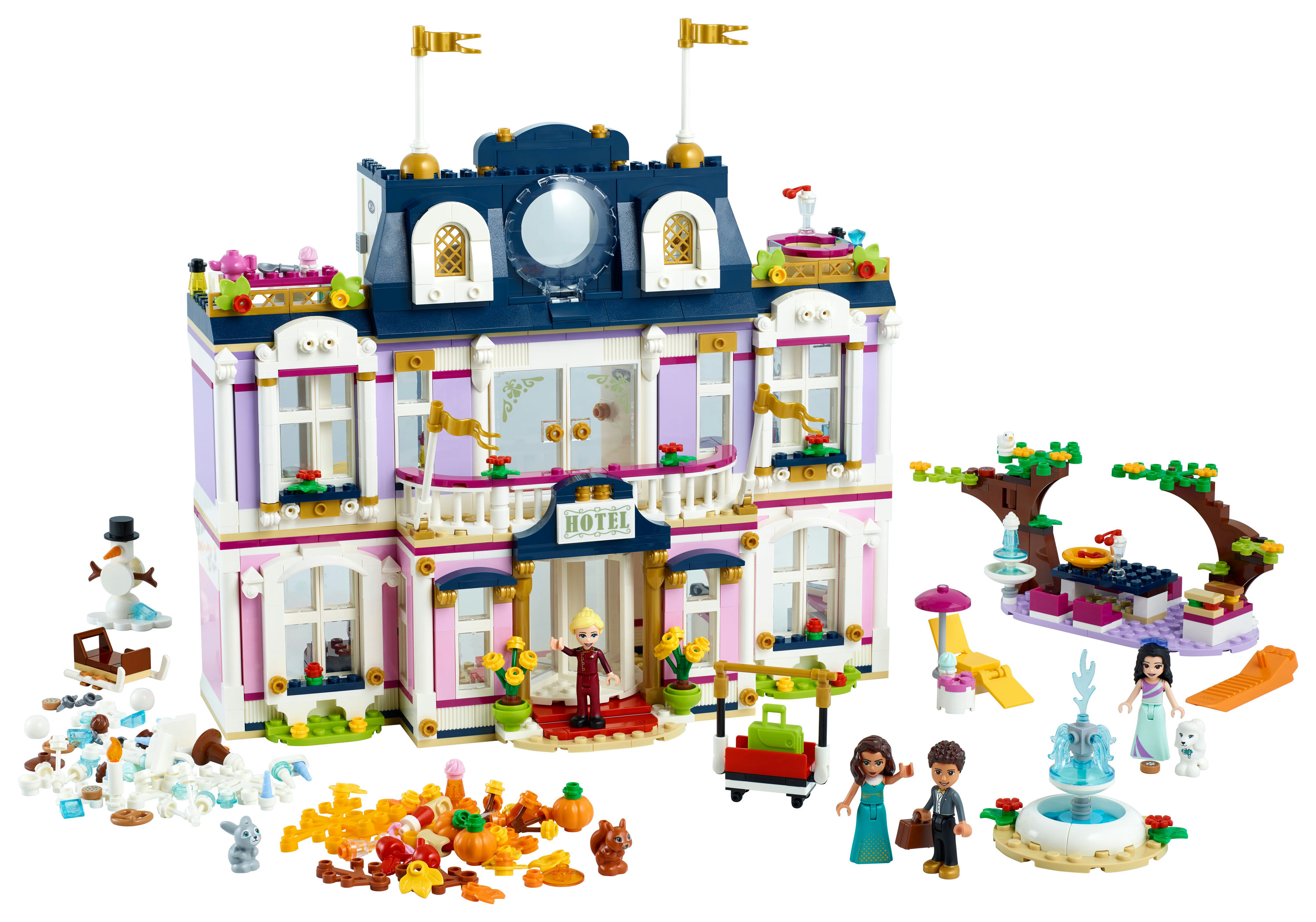 Set Lego Friends hotel con personaggi e accessori, un grande edificio colorato.