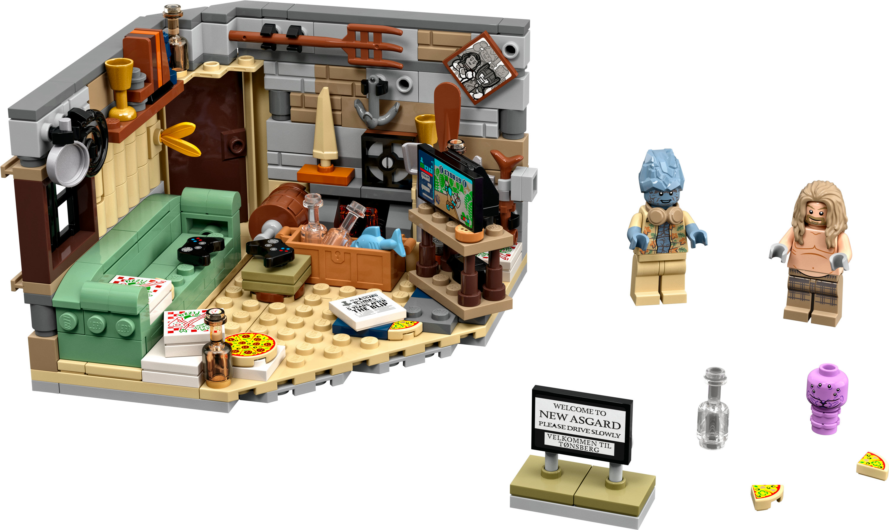 Lego Set eines Zimmers in New Asgard mit zwei Figuren. Ein Schild sagt: 'Willkommen in New Asgard'.