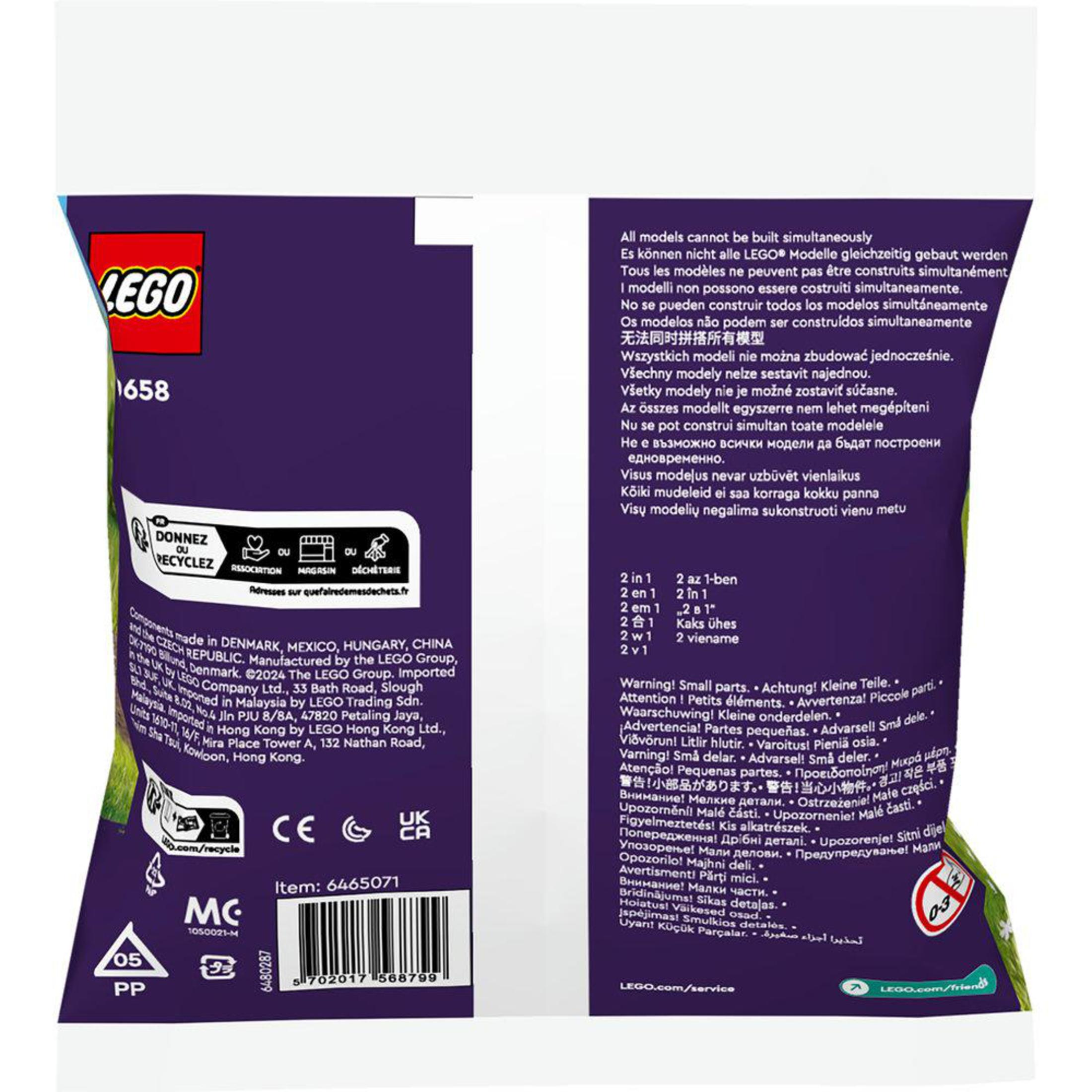Un set Lego Ninjago con un veicolo verde, un veicolo blu e minifigure.
