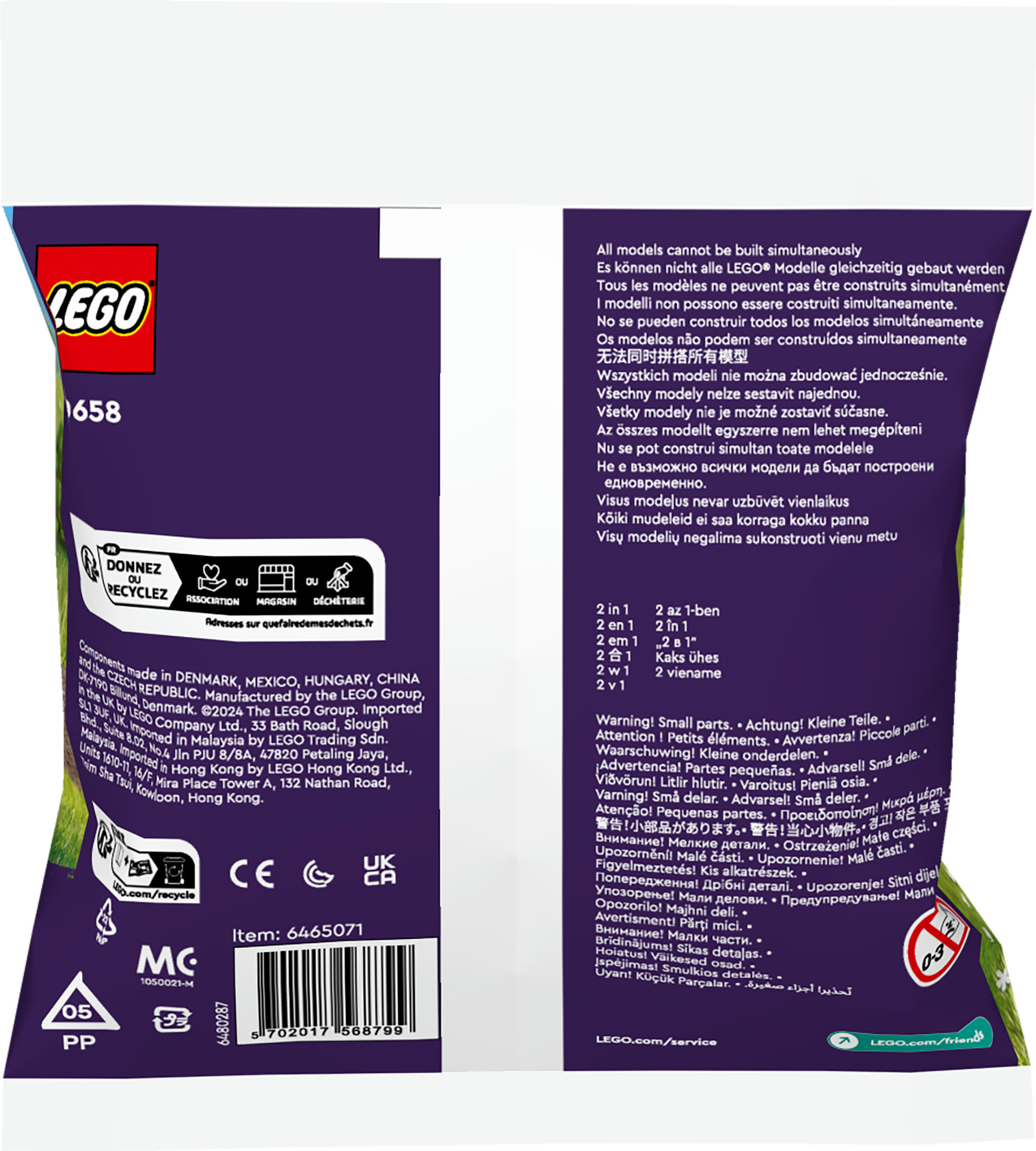 Un sac Lego avec du texte en plusieurs langues et des avertissements sur les petites pièces.