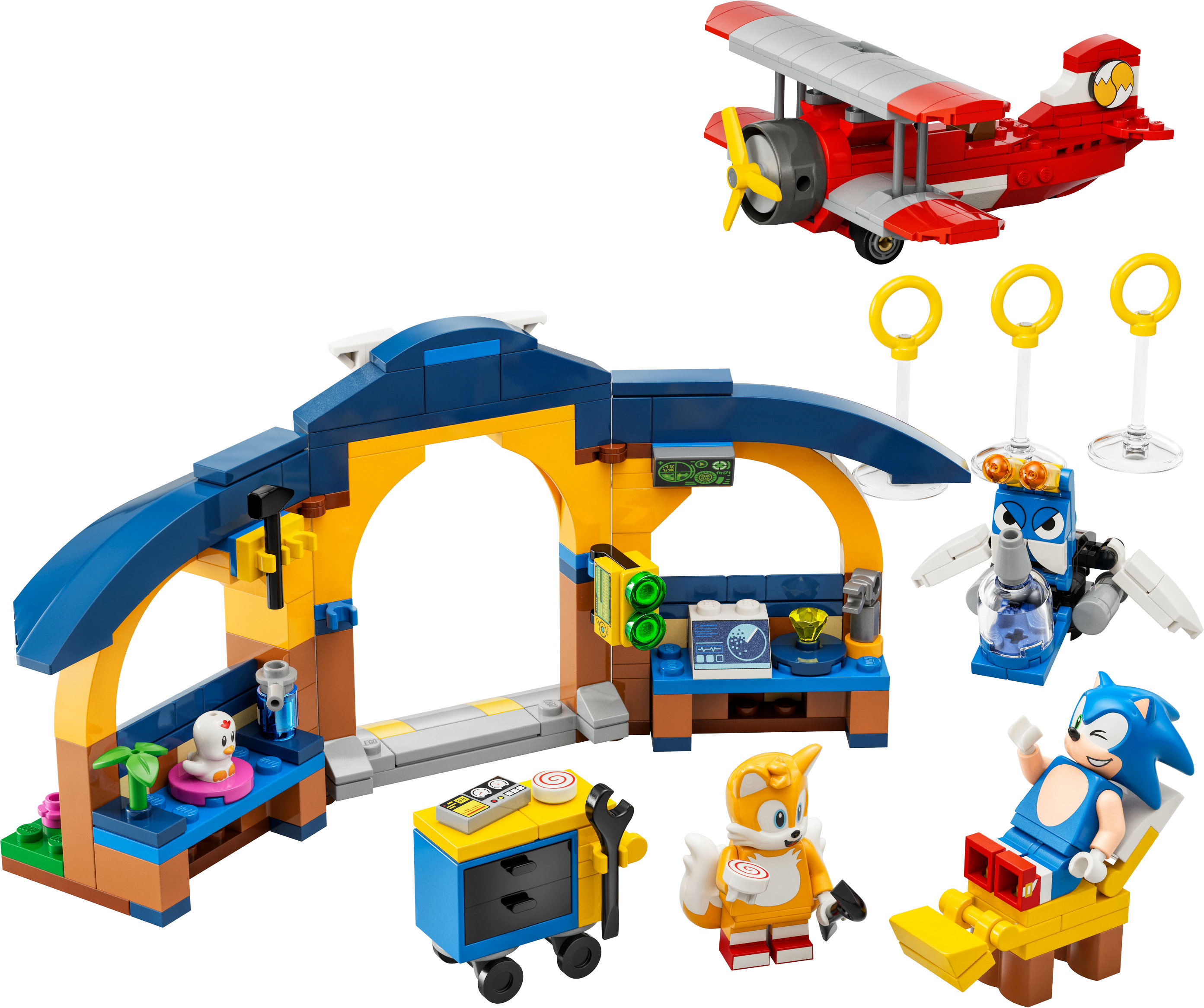 Lego Sonic the Hedgehog Set mit Figuren, einem Doppeldecker, Ringen und einer Werkstatt.
