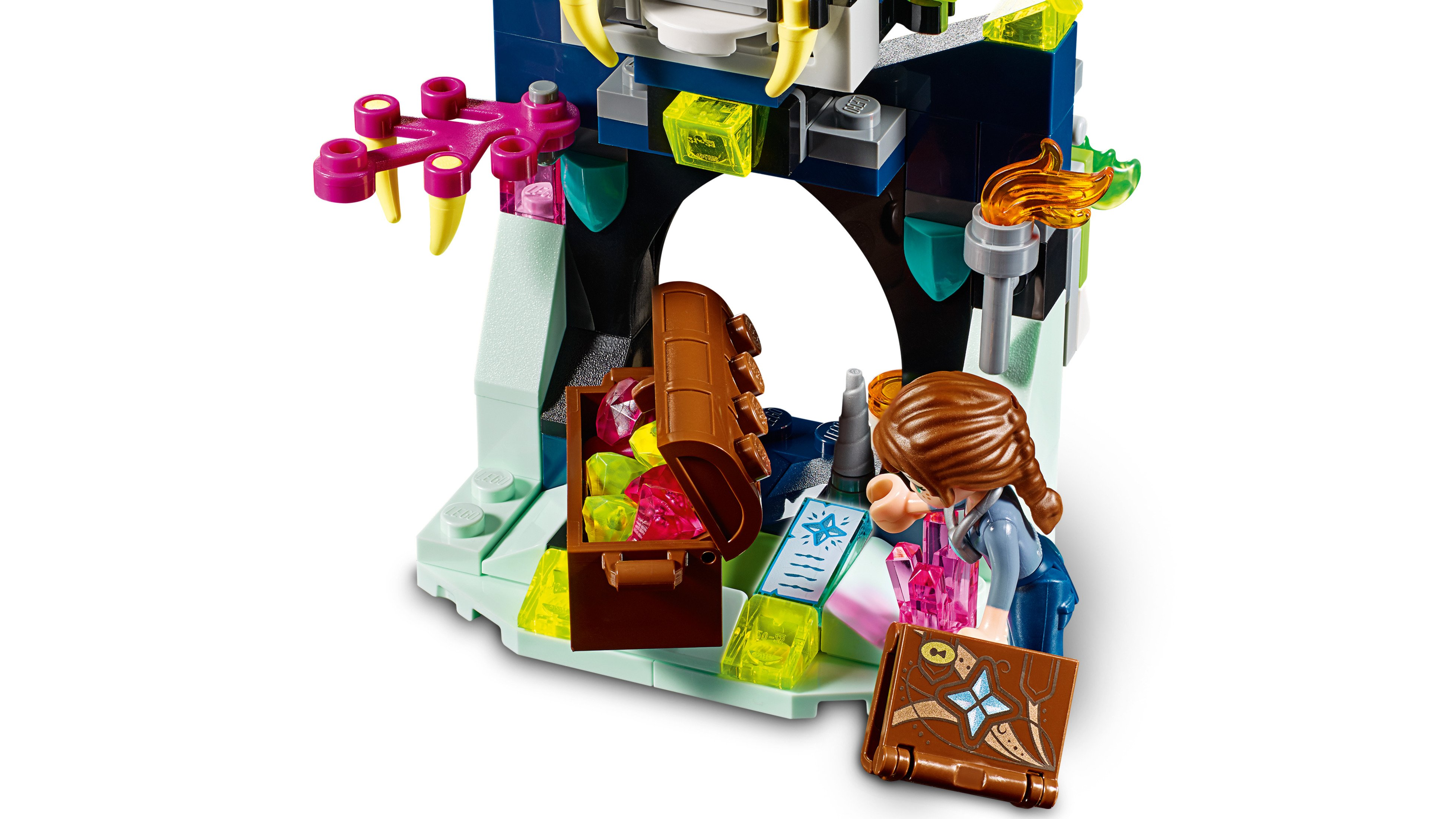 Lego-Set mit Turm, Edelsteintruhe und einer Figur.