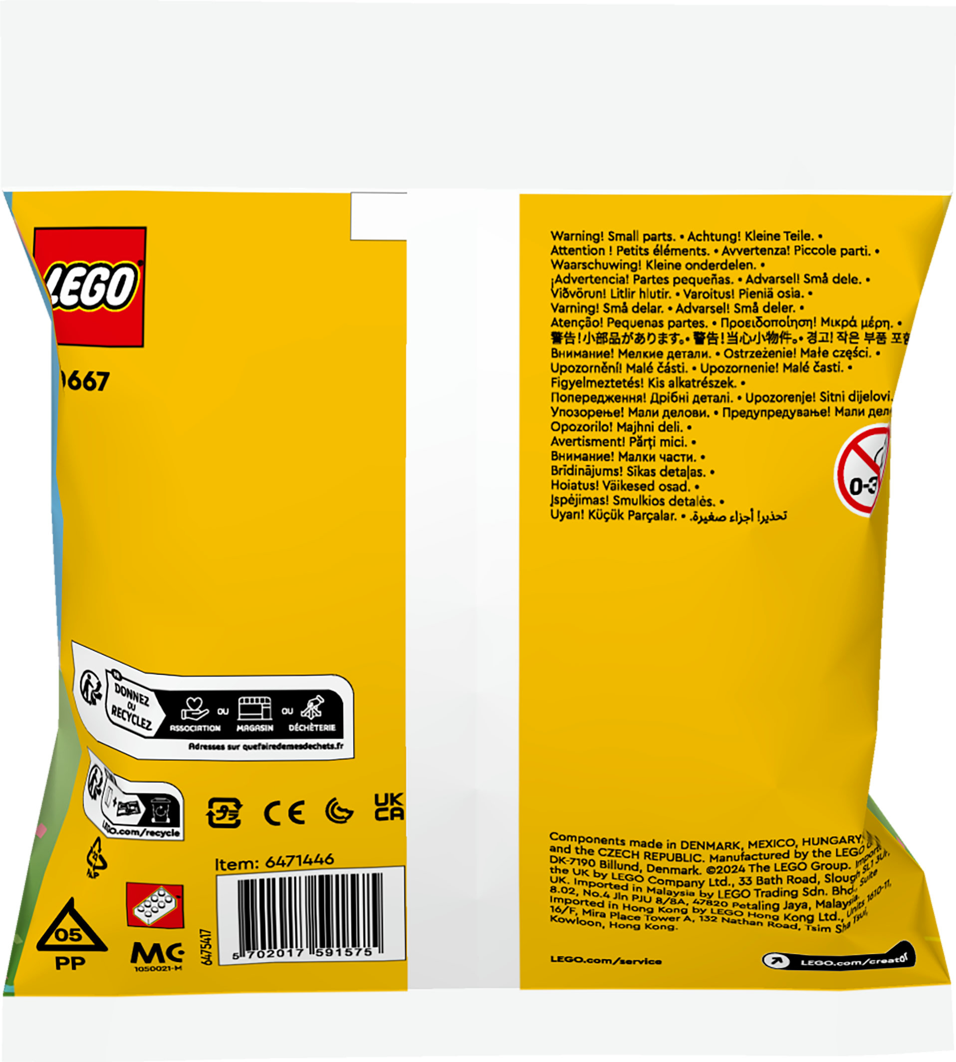 Çok dilli uyarı sembolleri ve metin içeren Lego set ambalajı.