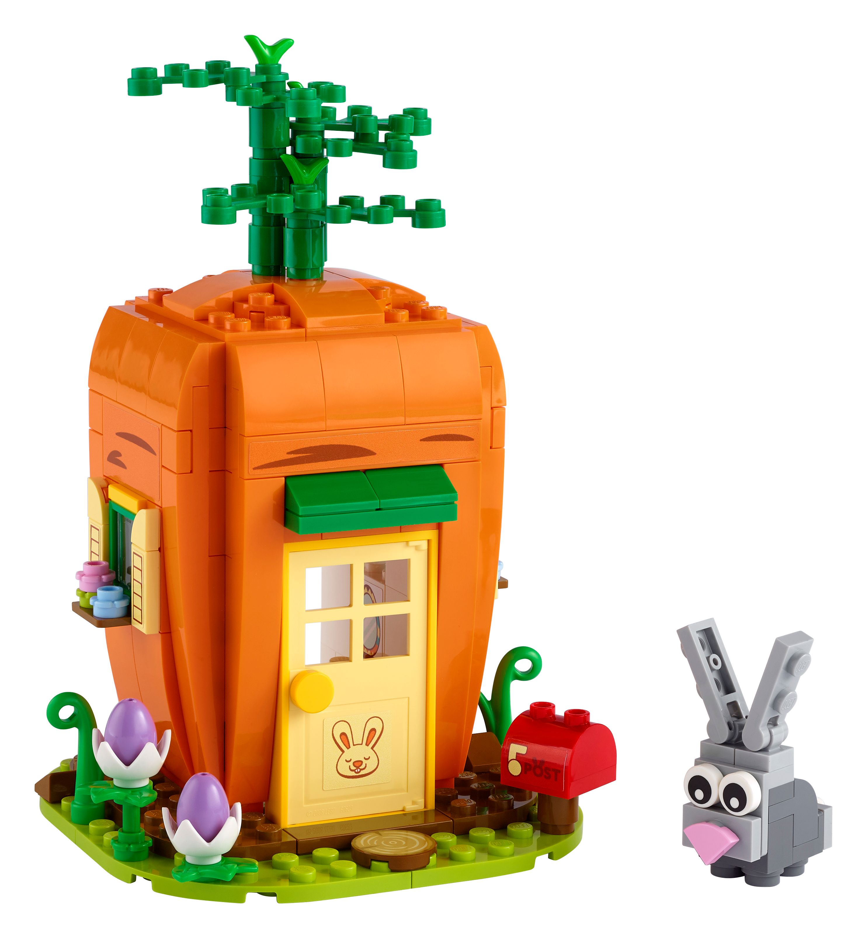 LEGO-Karottenhaus mit Tür und Fenster, einem Kaninchenmodell und einem Briefkasten, alles auf weißer Basis.
