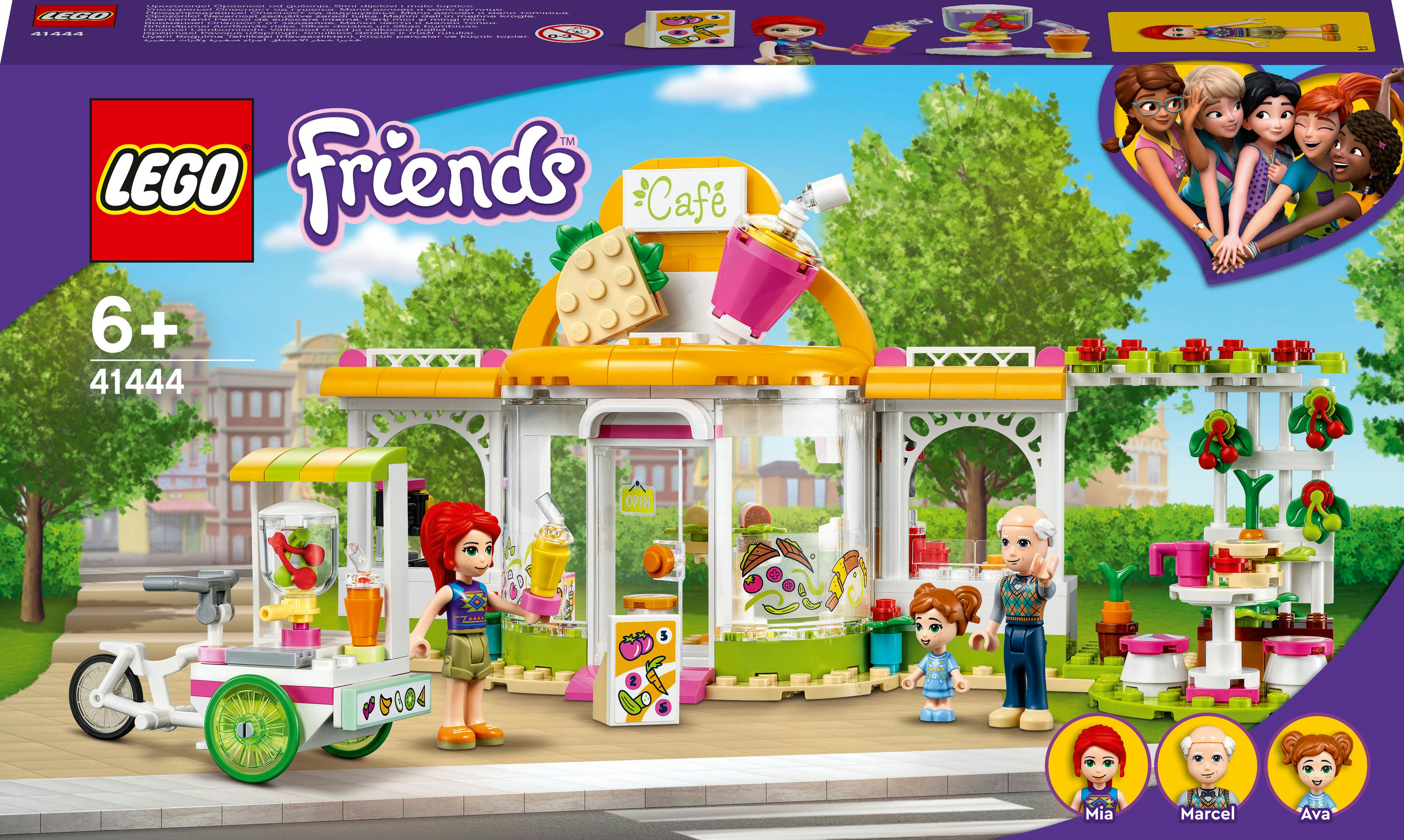 Un set Lego Friends caffè con minifigure, edificio e carrello, all'aperto.