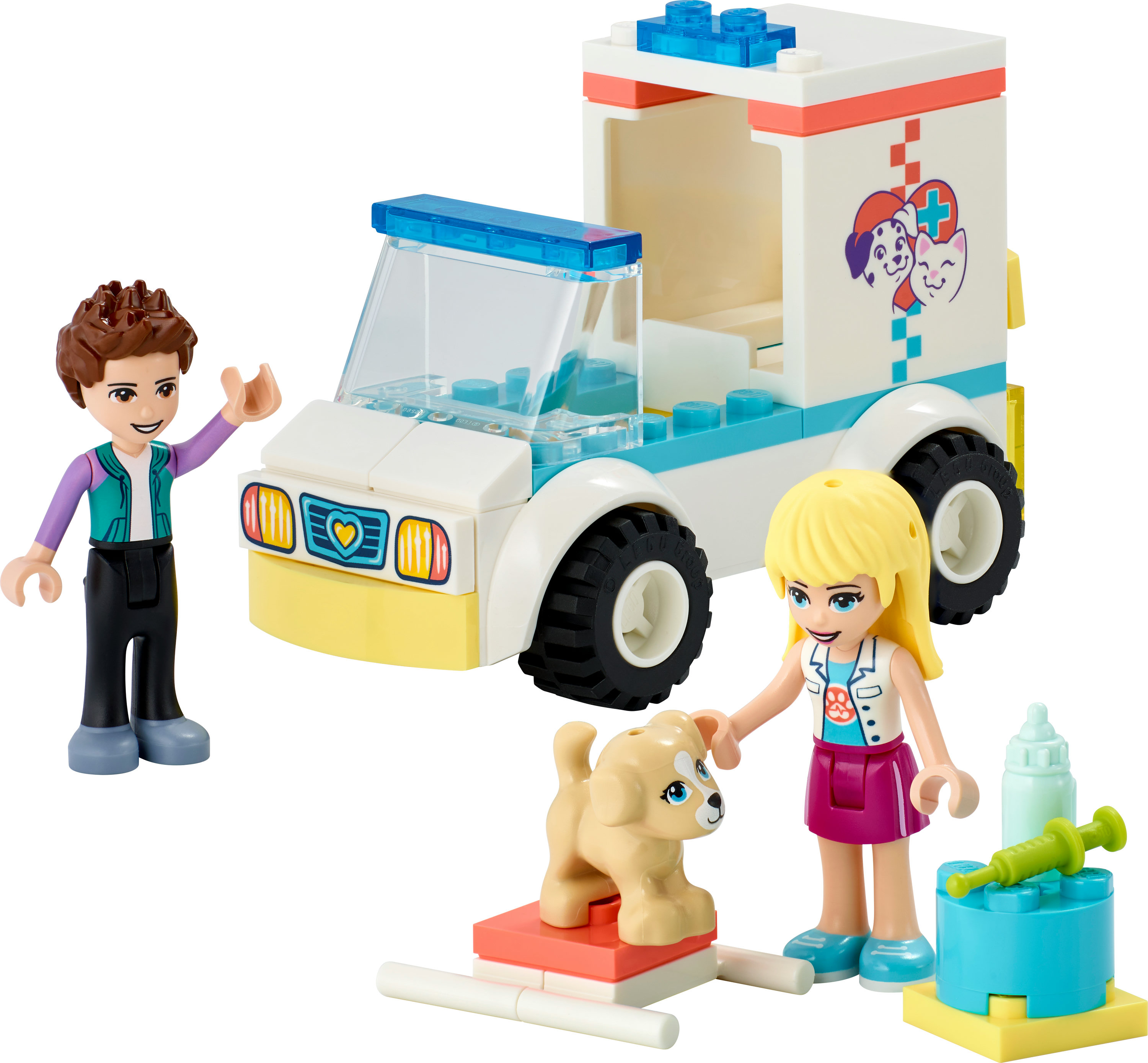 Ein Lego Friends Set mit Figuren, einem Tierarztwagen, einem Welpen und einigen medizinischen Werkzeugen.