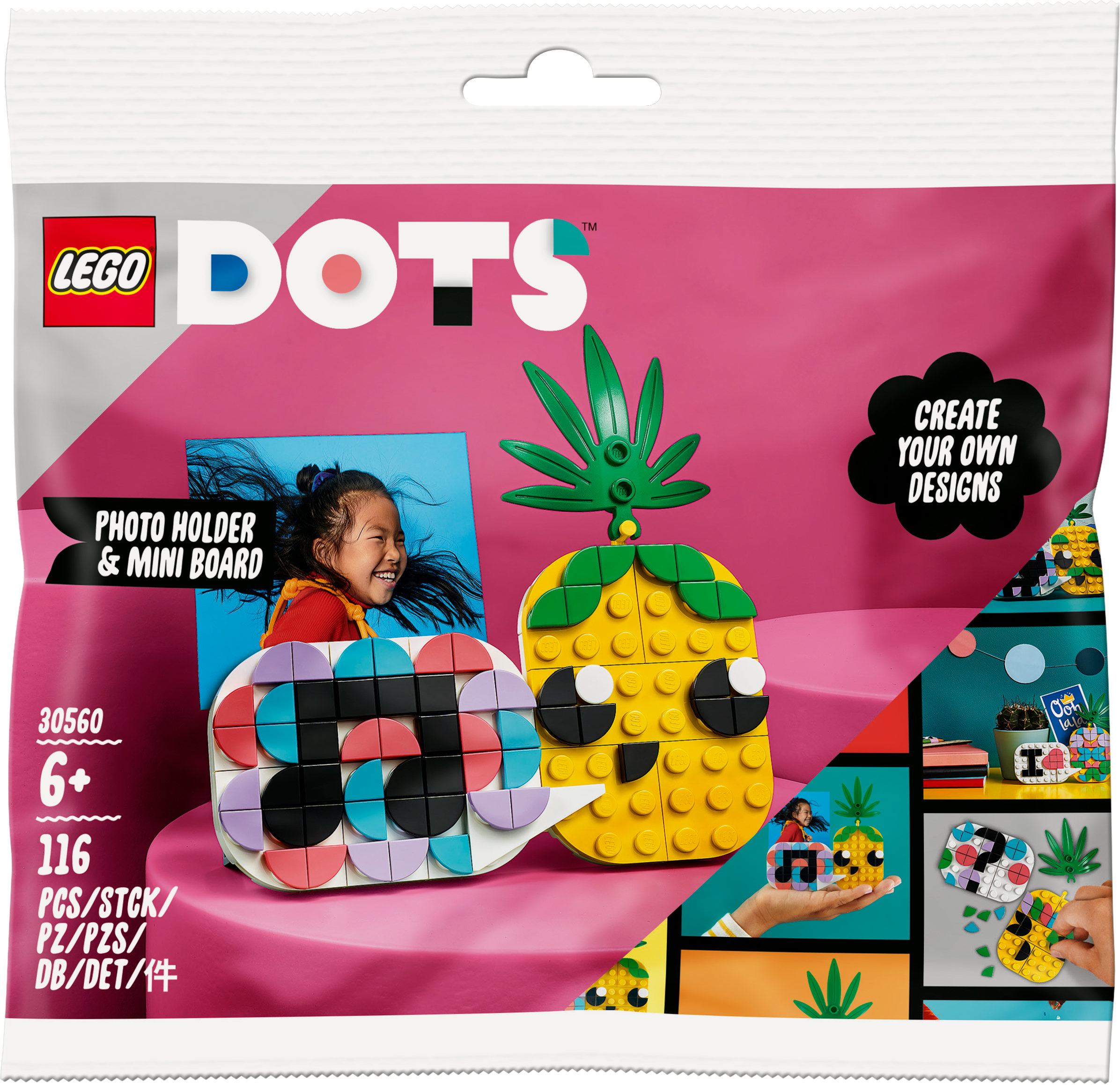 Set Lego Dots. Una ragazza tiene un portafoto con una mini lavagna e ananas.