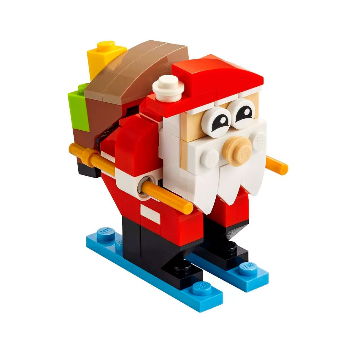 Lego Święty Mikołaj na nartach. Ma na sobie czerwony strój, białą brodę i niebieskie narty.