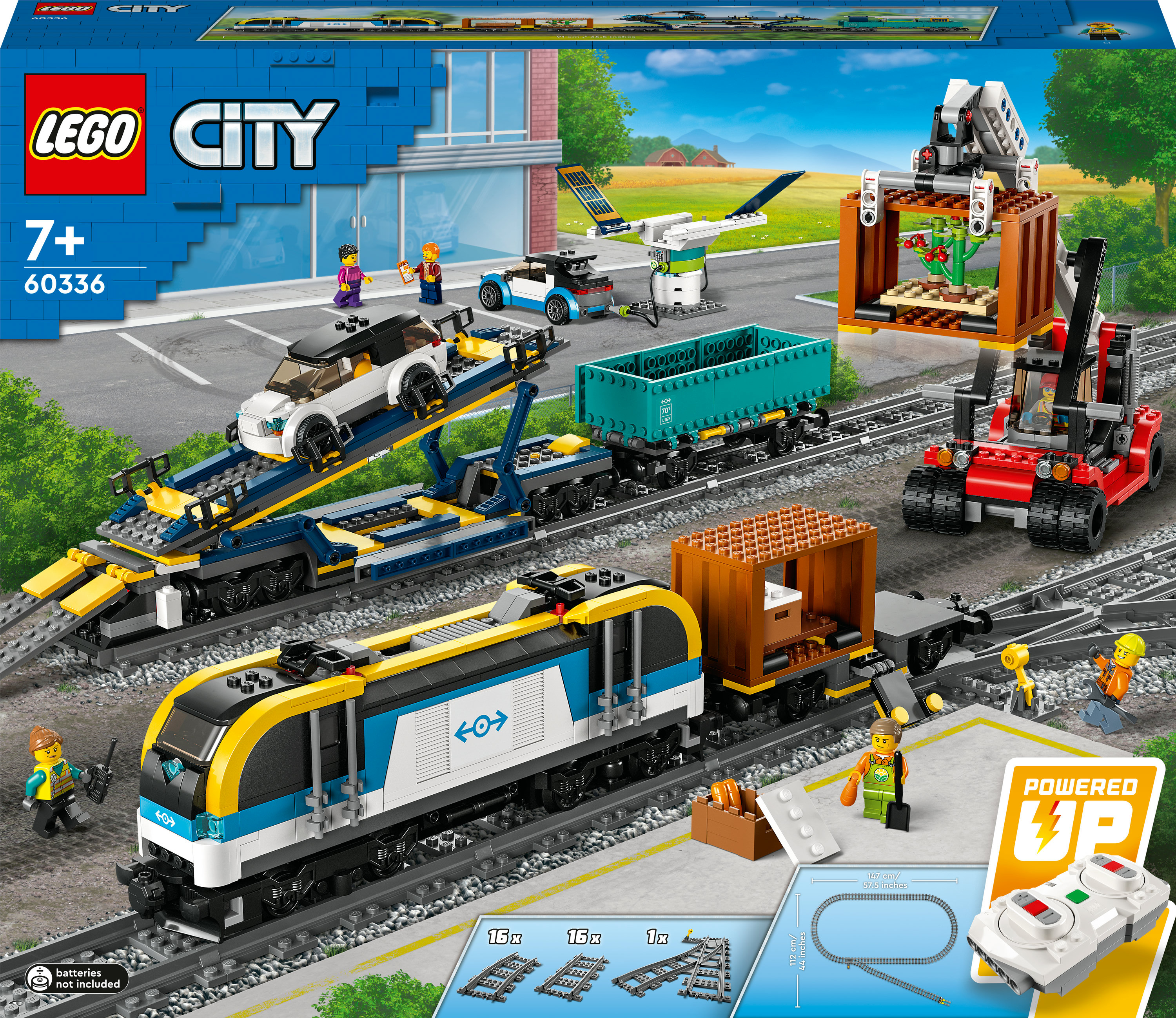 Zestaw LEGO City z pociągiem w kolorze niebiesko-żółtym, torami i innymi pojazdami.