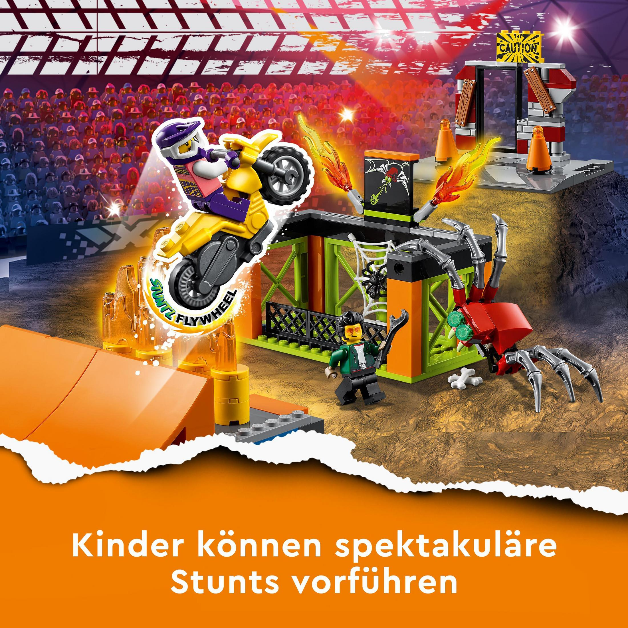 Una escena Lego con una moto acrobática, una araña y un escenario con luces y rampas.