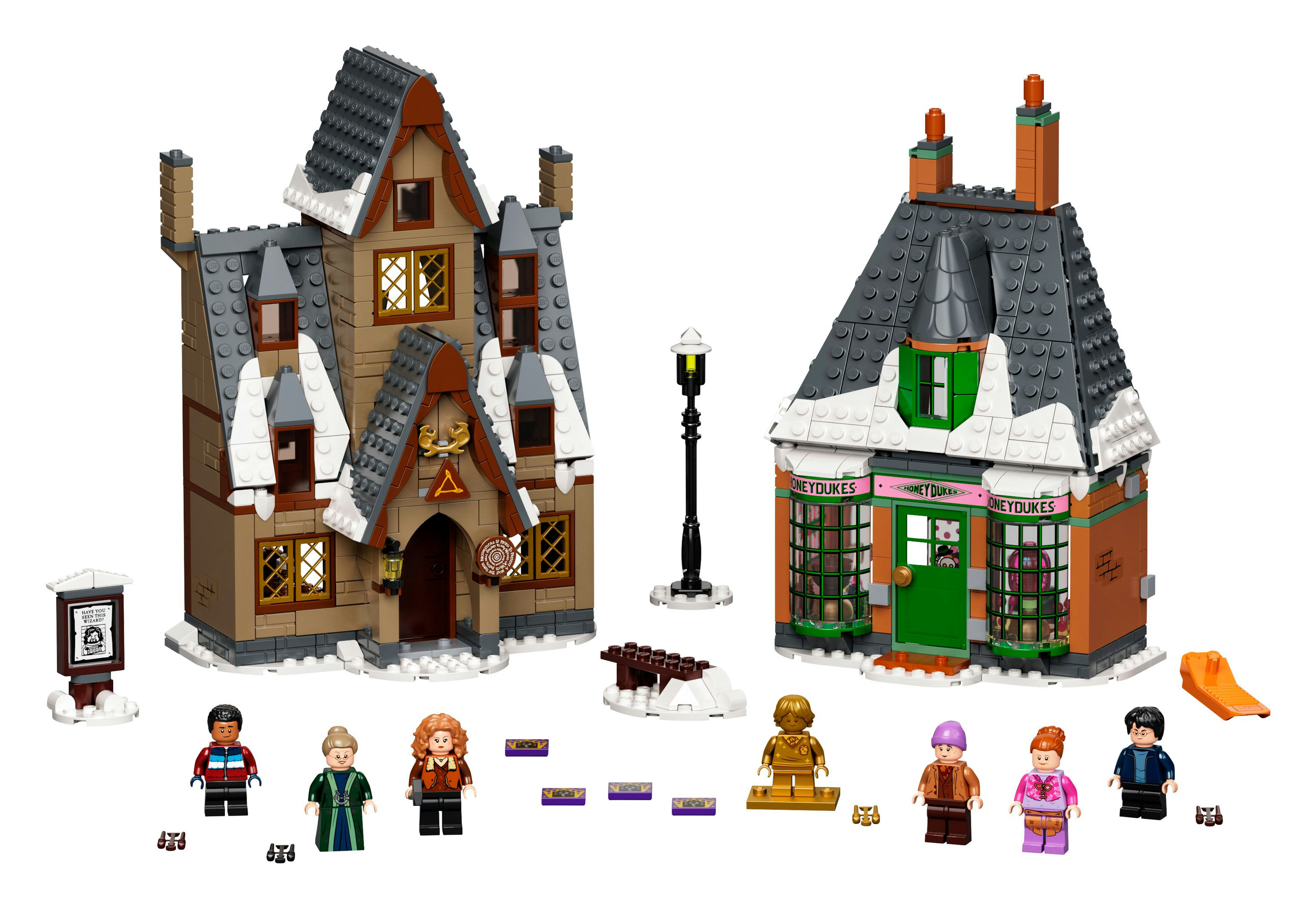 Ein Lego-Set von zwei Gebäuden mit Figuren davor. Eines ist ein Laden, das andere ein Haus.