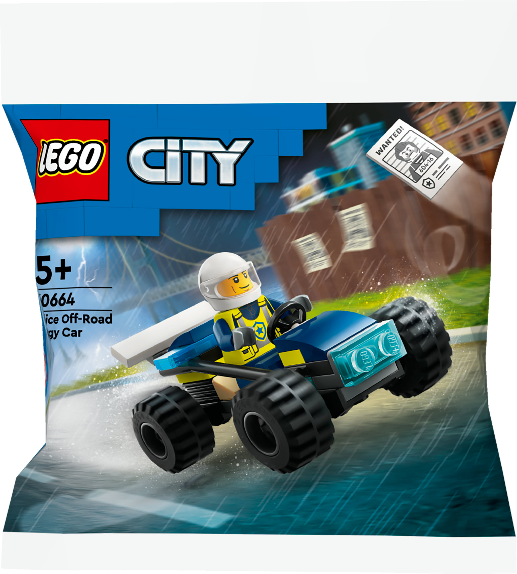 LEGO City seti bir torbada, polis arabası, kasklı bir sürücü ve arka planda 'Aranıyor' afişi.