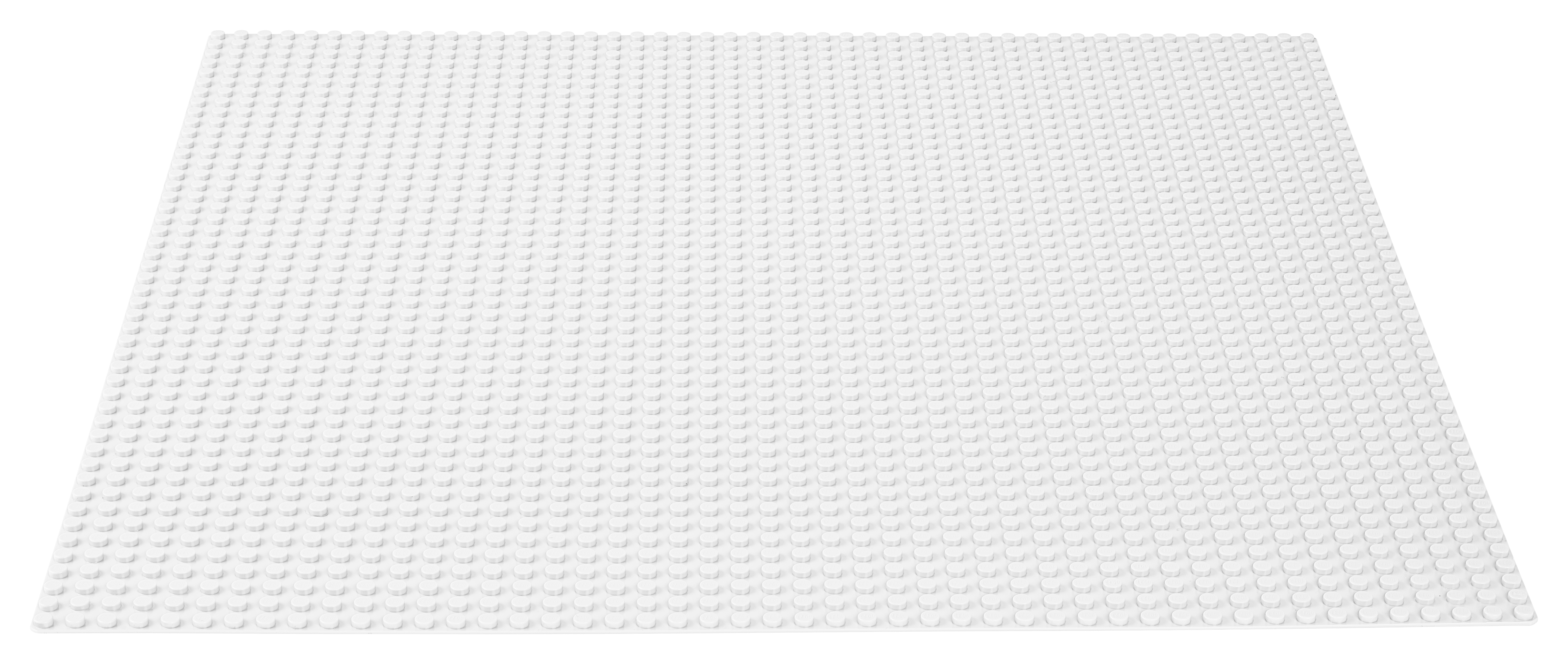 Weiße Lego-Grundplatte. Eine große, flache Oberfläche mit vielen kleinen, kreisförmigen Noppen, gleichmäßig verteilt.