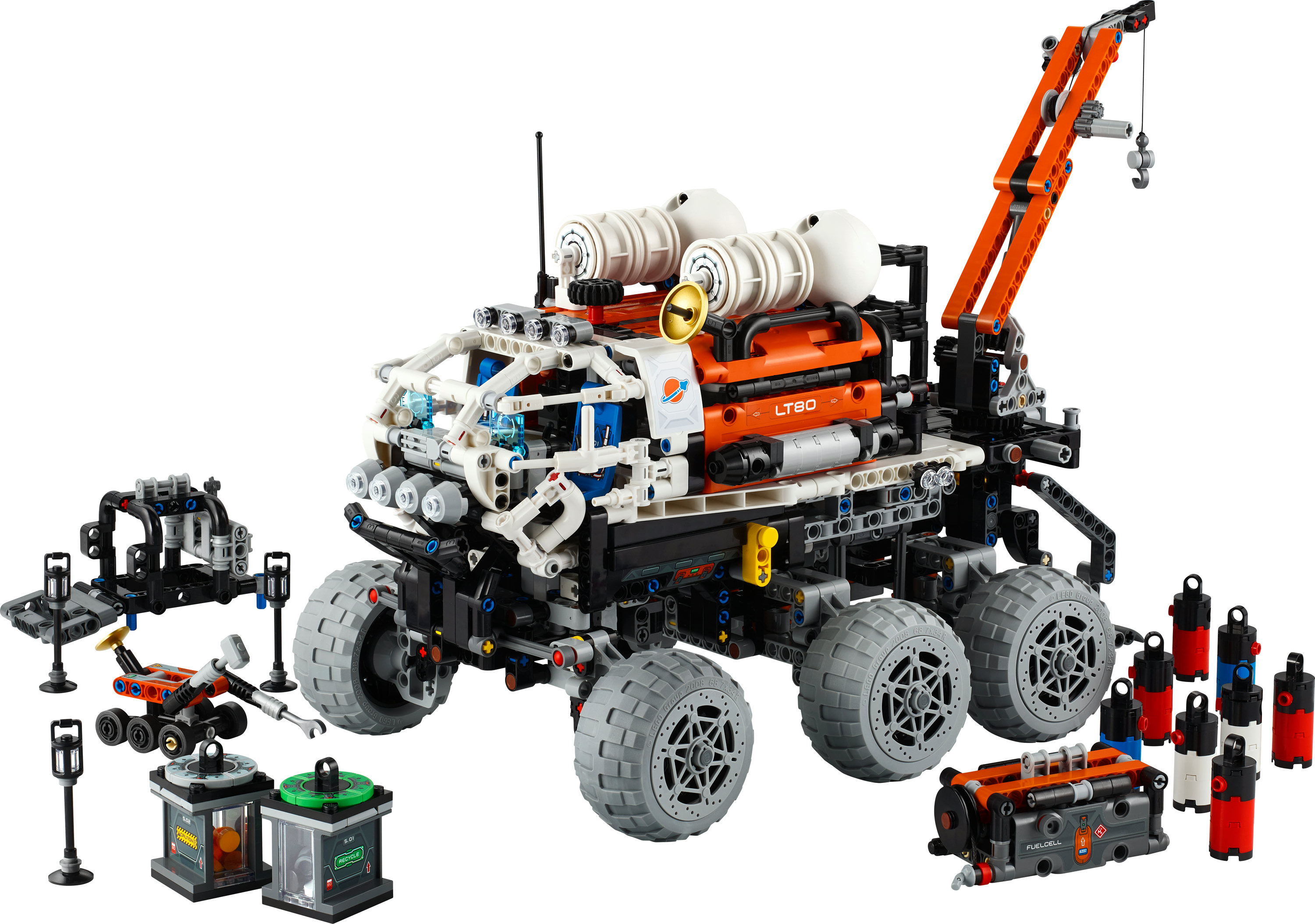 Zestaw Lego Technic z dużym pojazdem z pomarańczowymi i białymi detalami oraz innymi elementami.