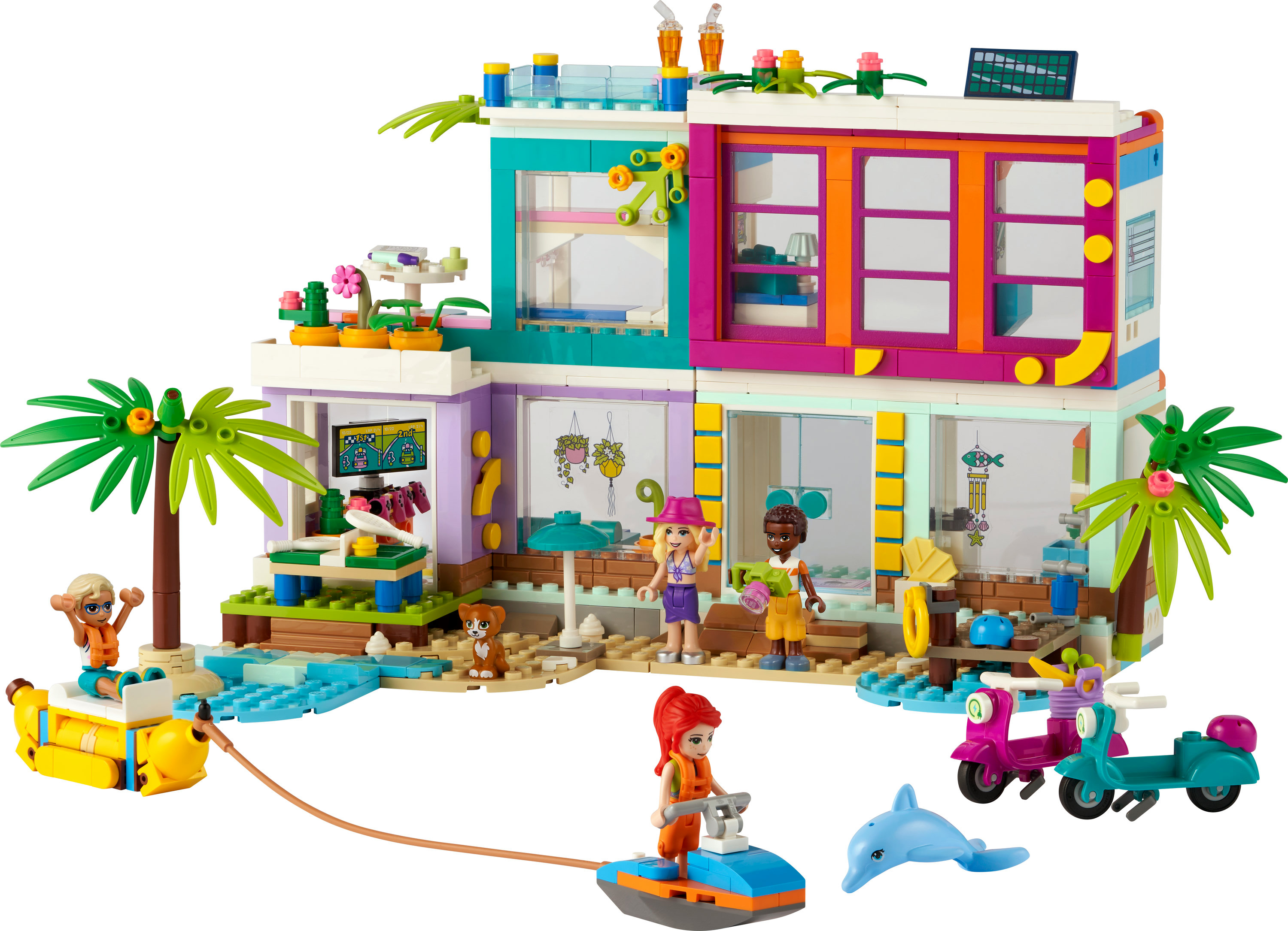 LEGO Friends set met figuren, een strandscène en diverse voertuigen. Een kleurrijke en speelse scène.