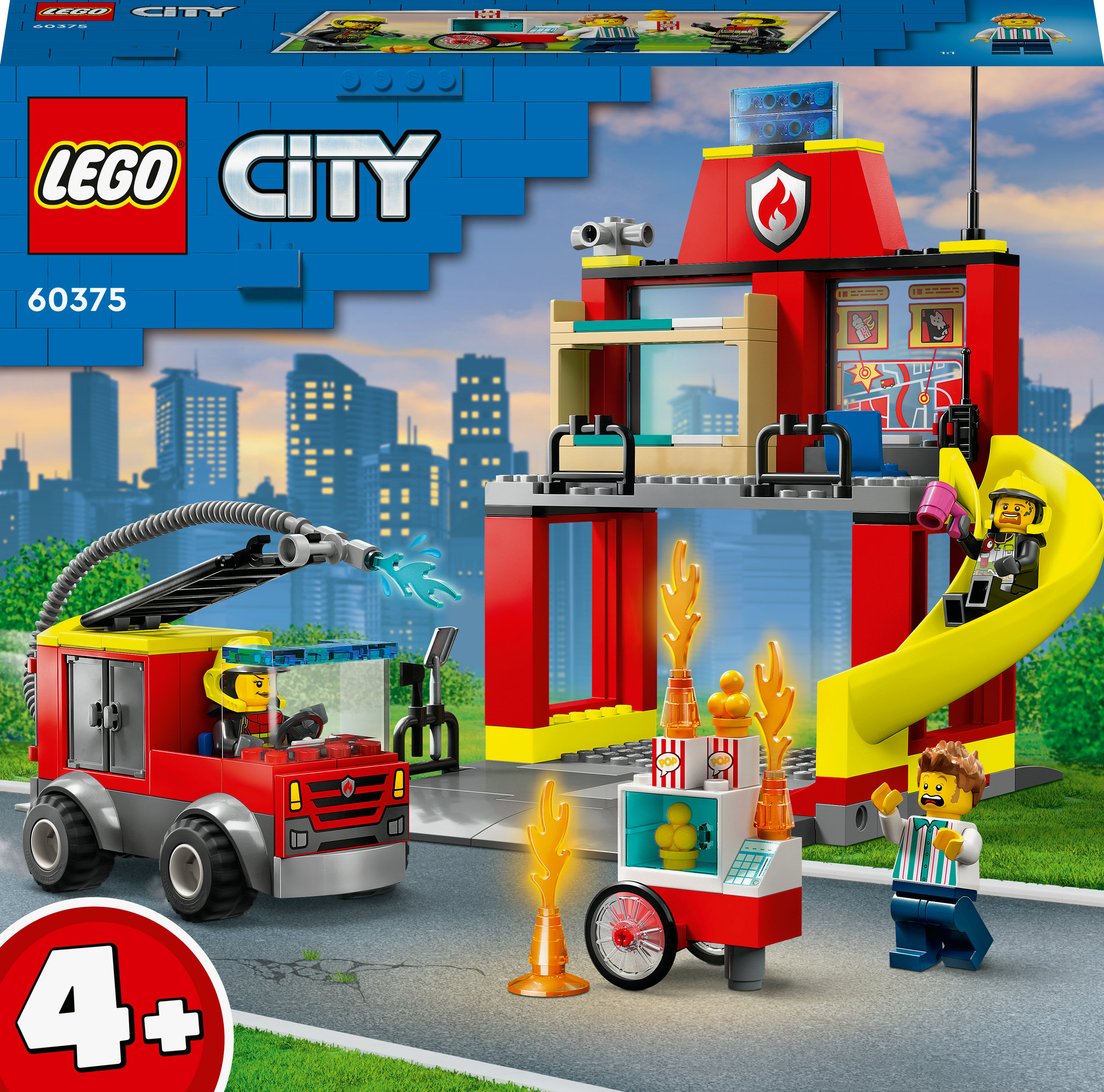 Un juego de estación de bomberos Lego City. Un camión de bomberos, un bombero y un tobogán son visibles.